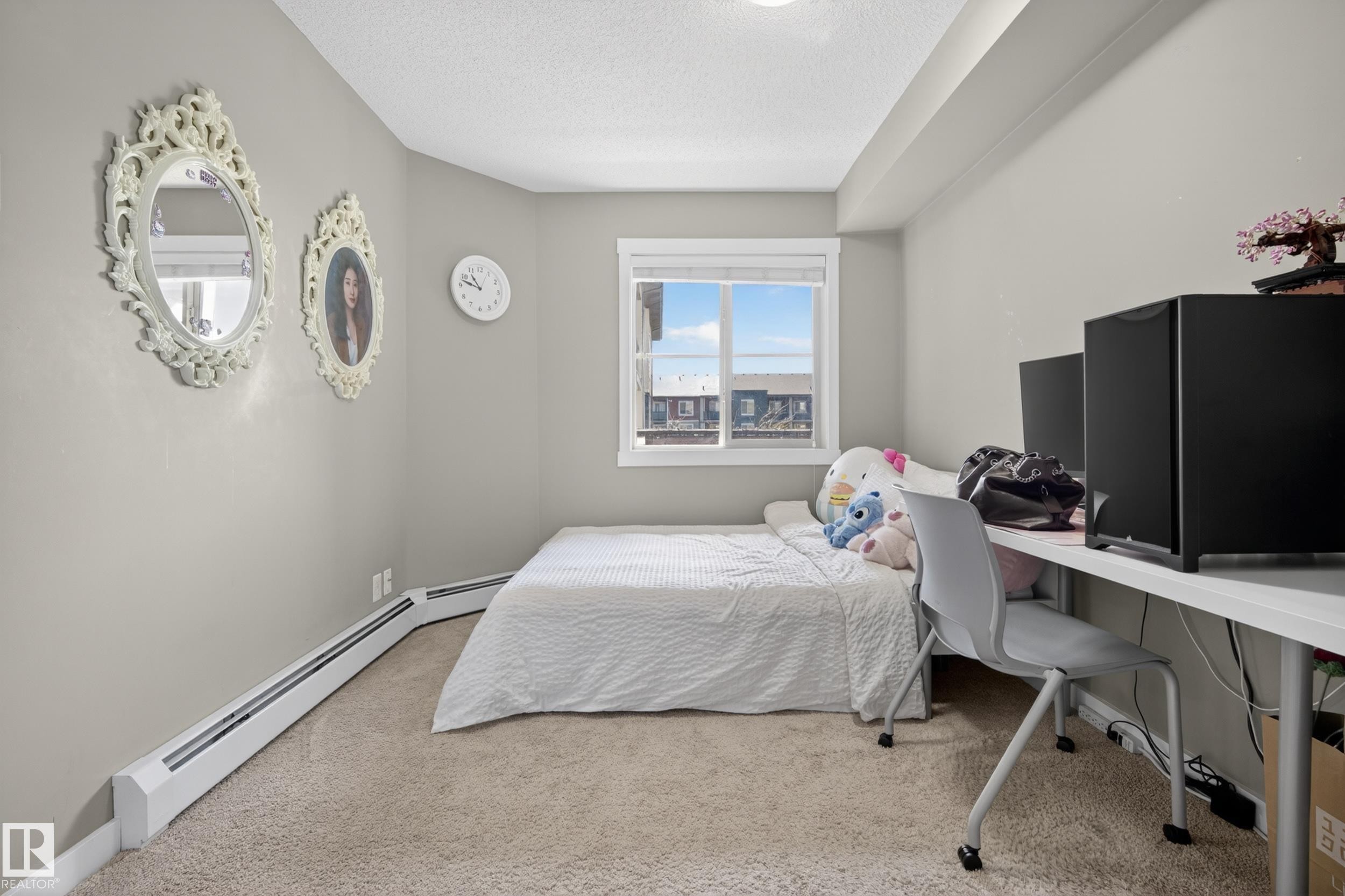 Carpeted room with a window providing exterior views - 314 3211 James Mowatt Trail Sw, Edmonton, AB - Indoor Photo Showing Bedroom
