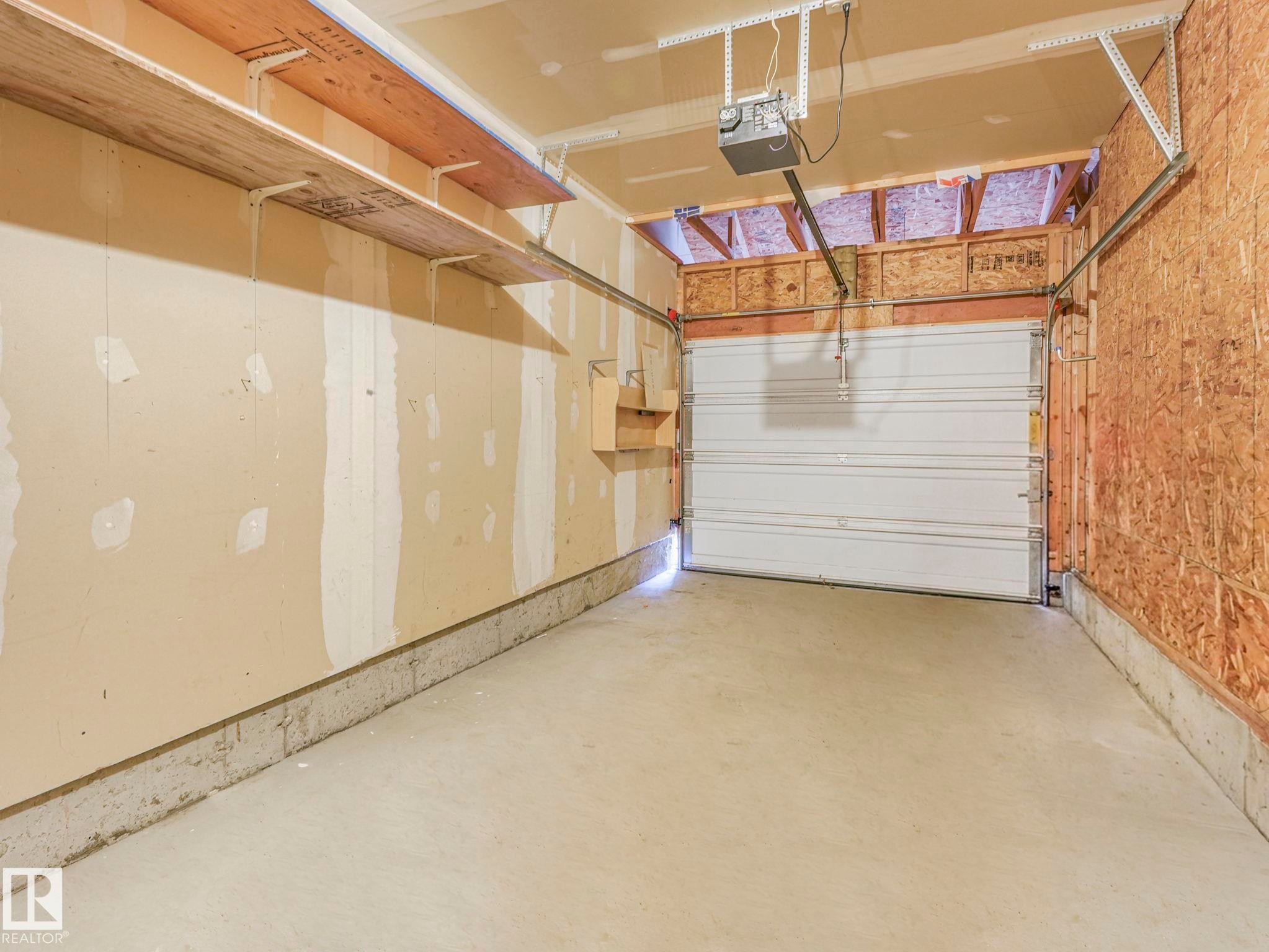 86 Meridian Loop Nw, Stony Plain, AB - Indoor Photo Showing Garage
