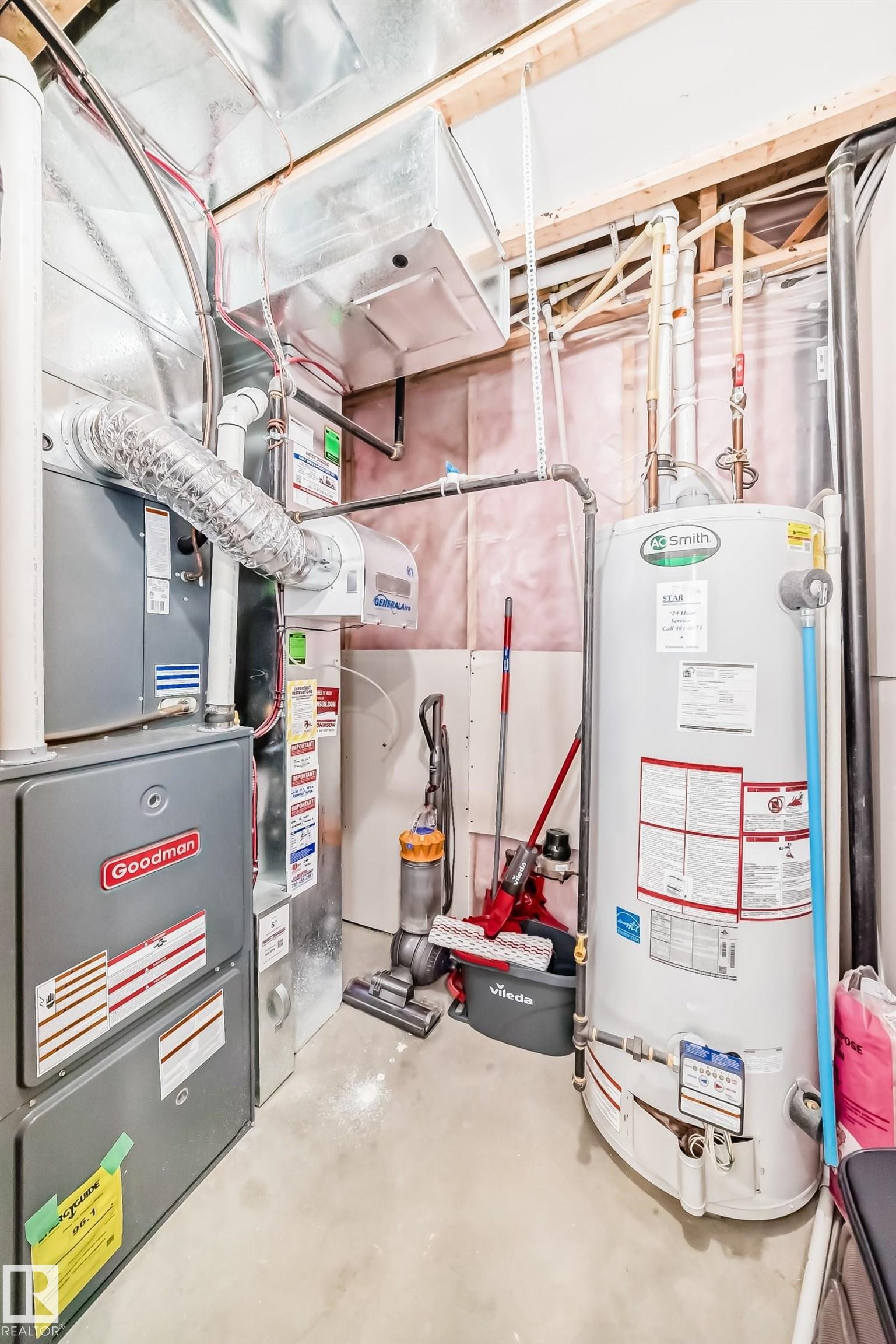 Utility space featuring a Goodman furnace, water heater - 6919 Cardinal Wynd, Edmonton, AB - Indoor Photo Showing Basement