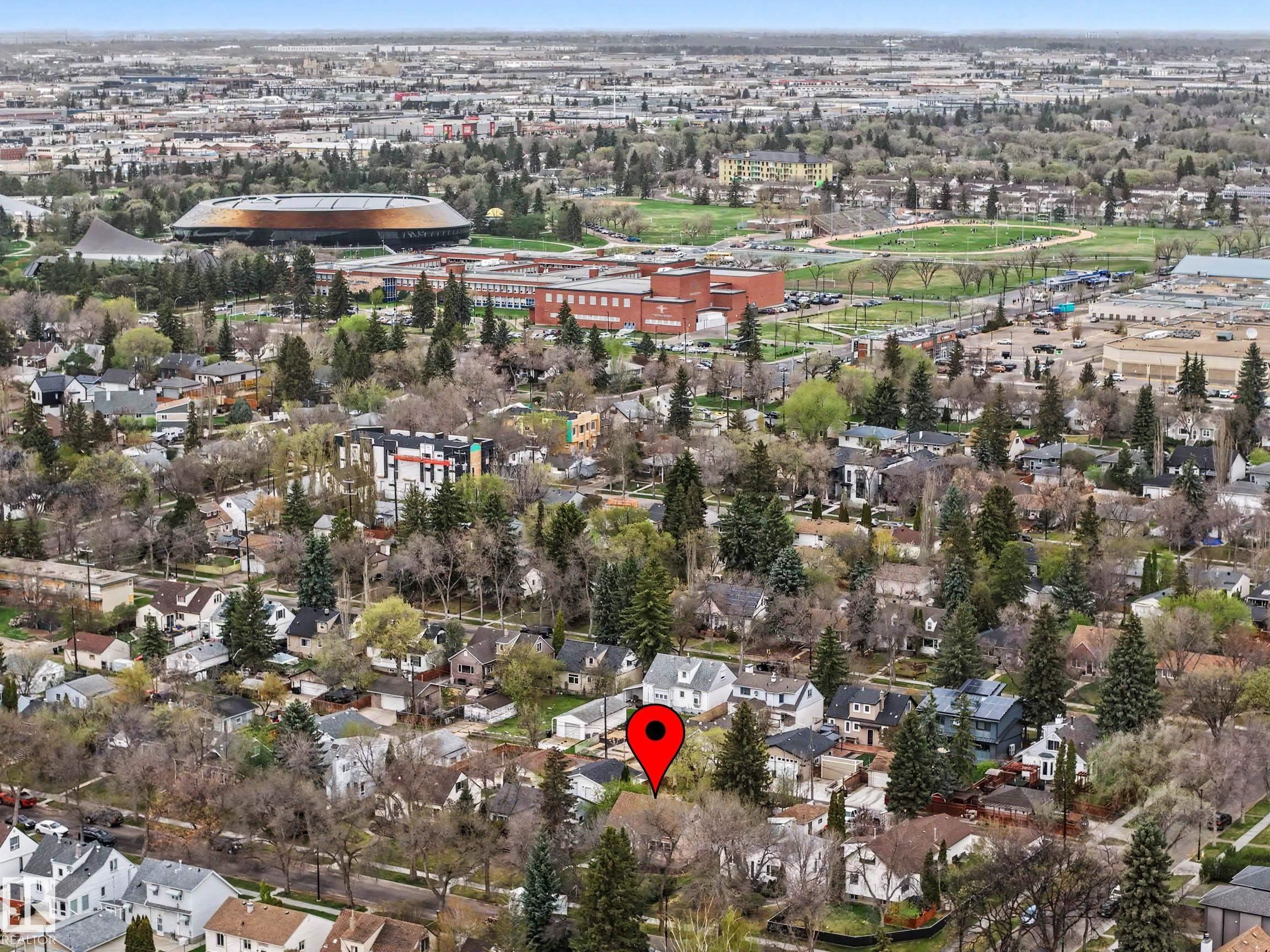 Aerial perspective showcasing a residential neighborhood with mature trees - 13316 109A Avenue, Edmonton, AB - Outdoor With View