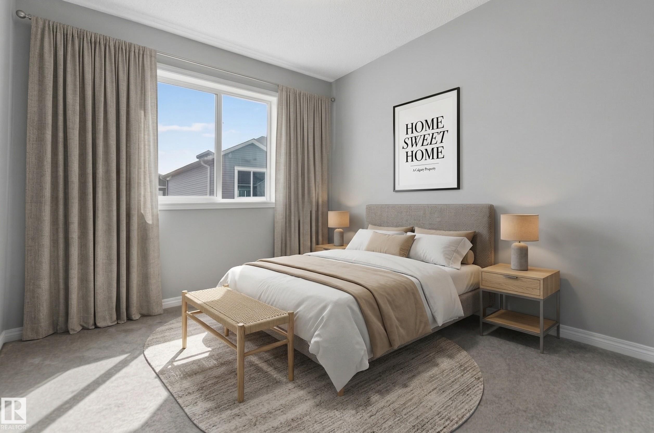 This room features a window providing natural light, carpeted flooring, and light gray wall paint - 15 2072 Wonnacott Way, Edmonton, AB - Indoor Photo Showing Bedroom
