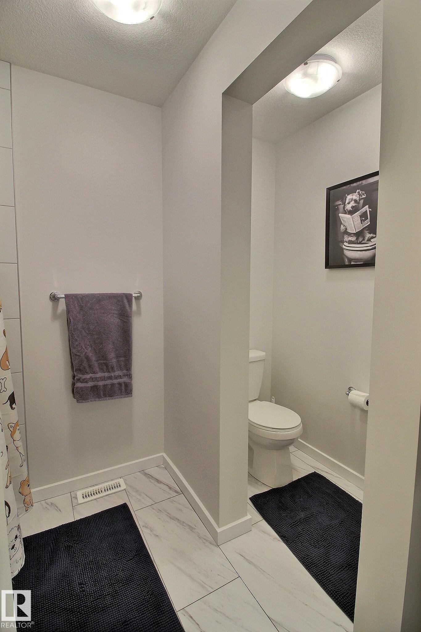 Dedicated water closet featuring a standard toilet - 121 Stiles Bend, Leduc, AB - Indoor Photo Showing Bathroom