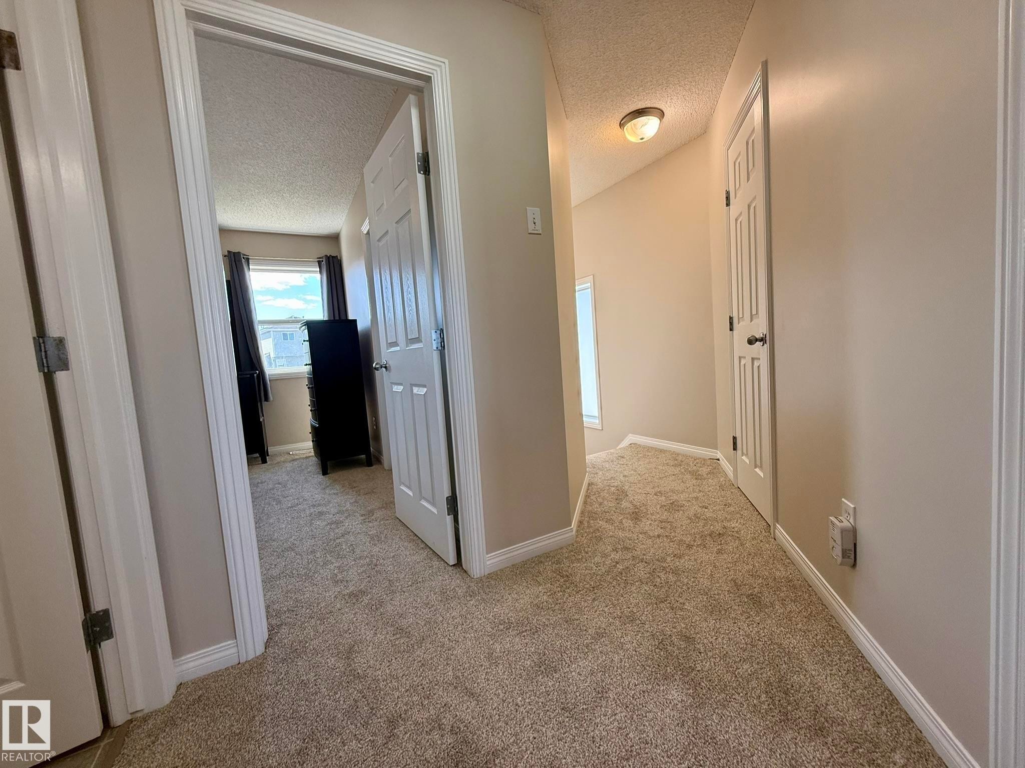 A CLEAR PHOTO OF ALL THE NEW PAINT AND CARPET TOO ON THE UPPER FLOOR! - 645 Windross Crescent, Edmonton, AB