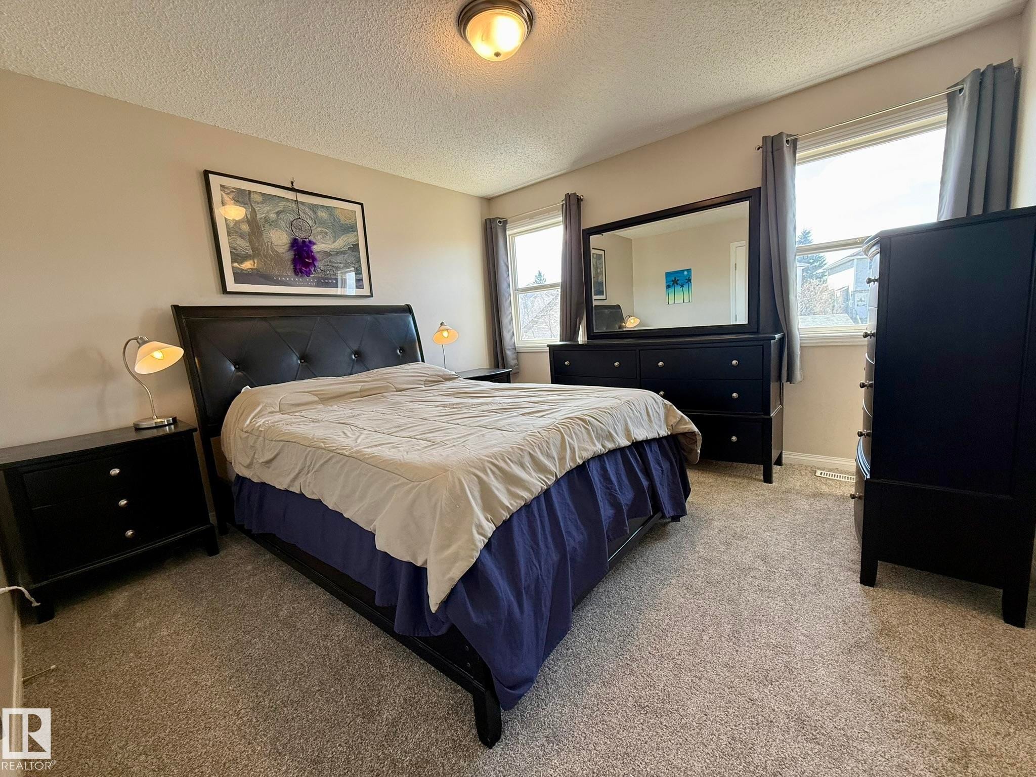 NICE SIZED PRIMARY BEDROOM FOR SPACE FOR AT LEAST A QUEEN SIZE BED! NOTE THE NEW PAINT & CARPET HERE TOO! - 645 Windross Crescent, Edmonton, AB