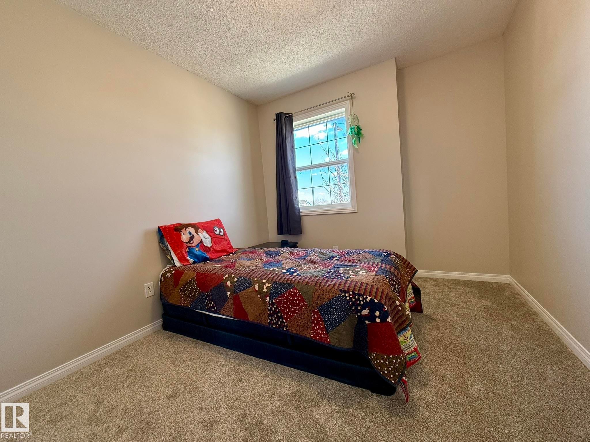 PHOTO OF THE 3rd UPPER FLOOR BEDROOM WITH ALL NEW PAINT & THE PLUSH CARPET TOO! - 645 Windross Crescent, Edmonton, AB