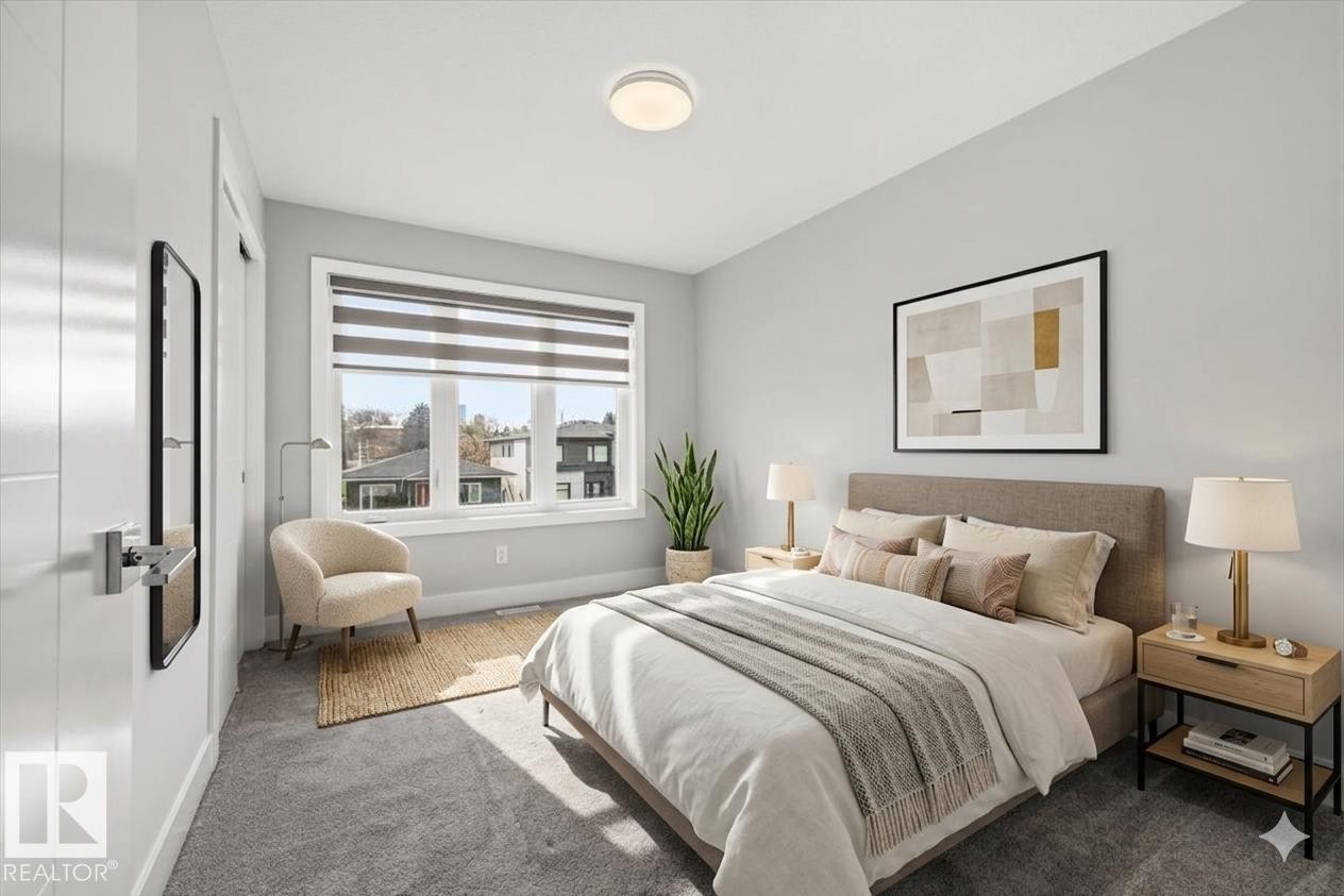 Bright room featuring a large window with privacy blinds, plush grey carpeting, and a built-in flush-mount ceiling light - 9933 79 Street, Edmonton, AB - Indoor Photo Showing Bedroom