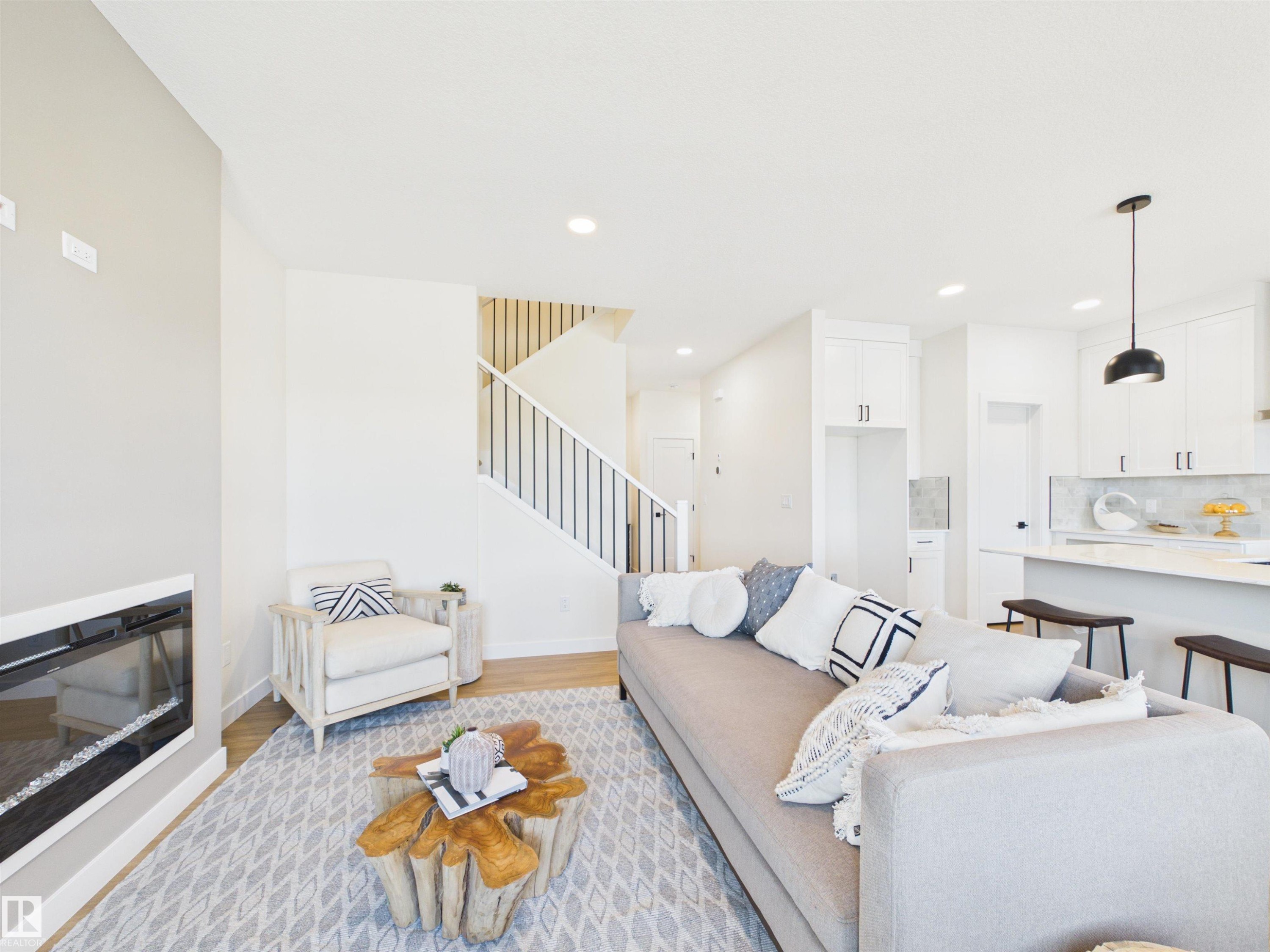 53 Sumac Close, Fort Saskatchewan, AB - Indoor Photo Showing Living Room With Fireplace