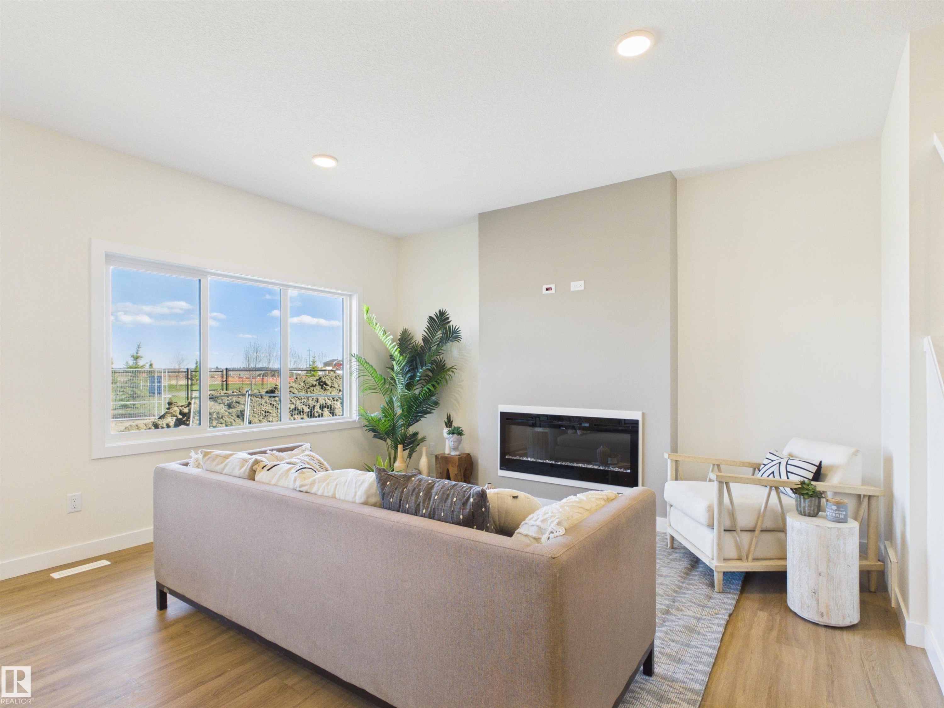 53 Sumac Close, Fort Saskatchewan, AB - Indoor Photo Showing Living Room With Fireplace