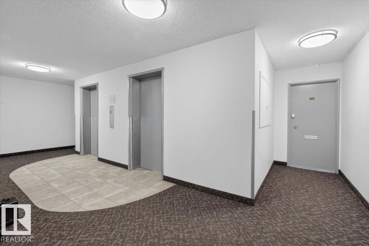 #405 10011 116 St Nw, Edmonton, AB - Indoor Photo Showing Other Room