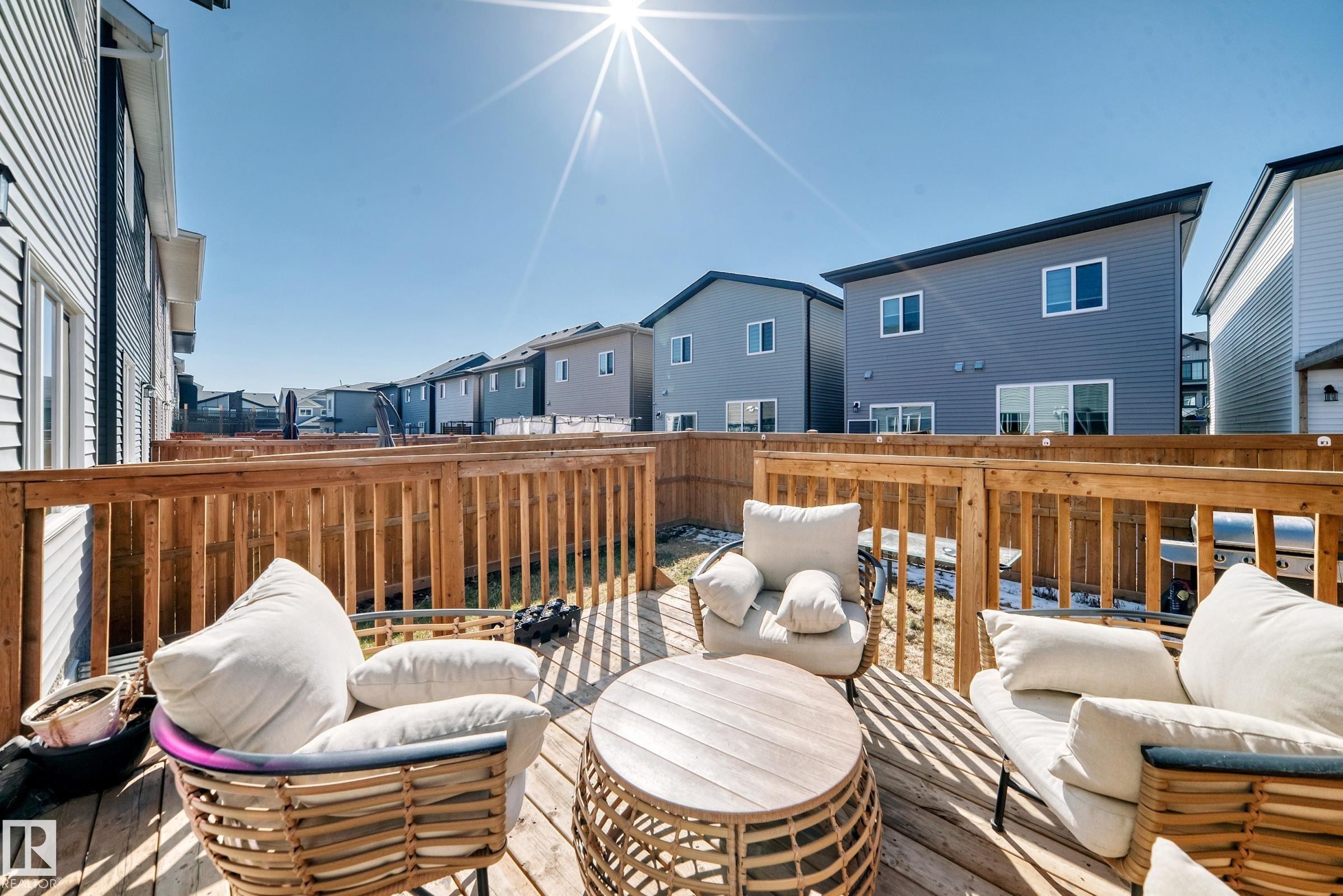 Expansive wood deck with natural wood railing - 19635 29 Avenue, Edmonton, AB - Outdoor With Exterior
