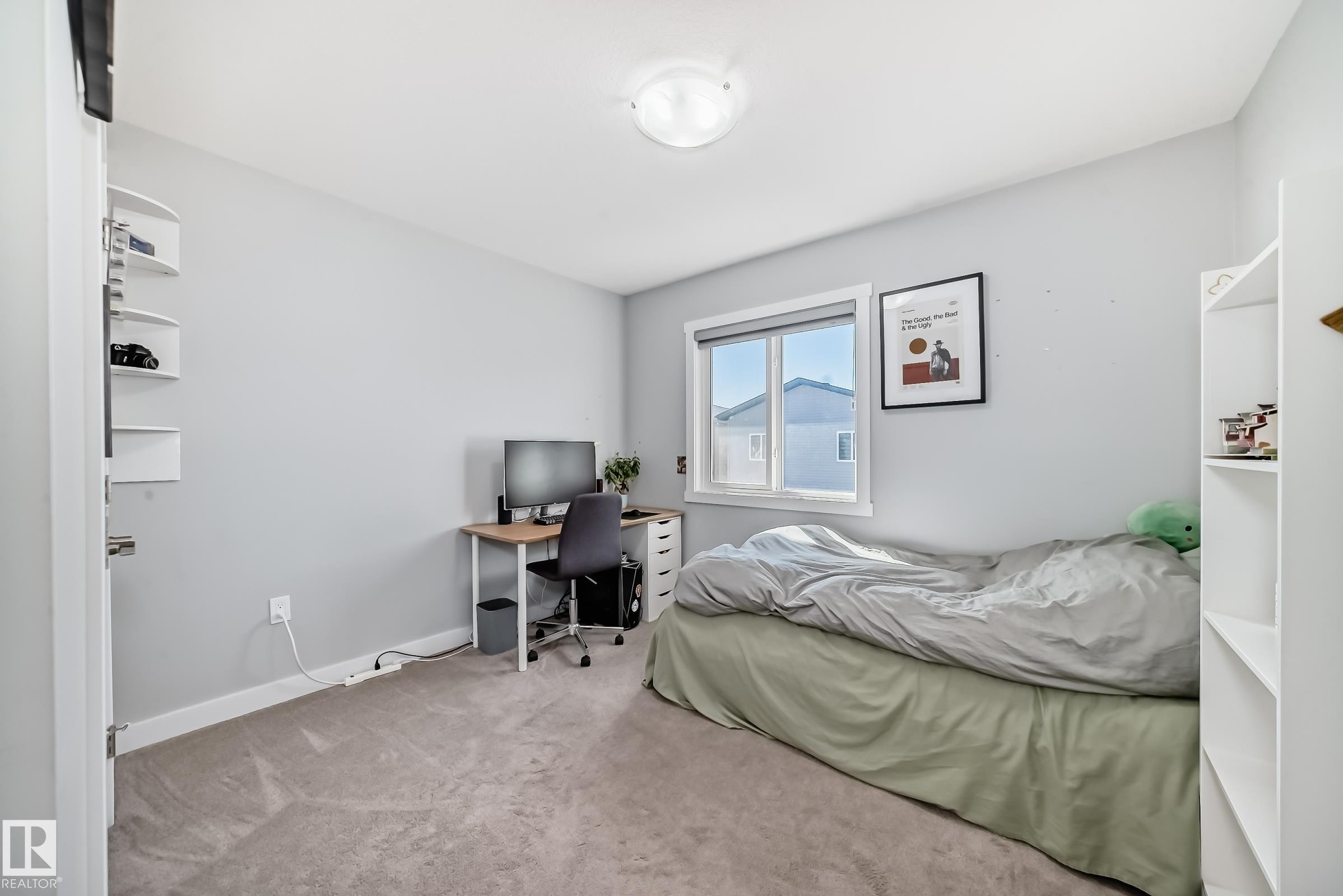 Carpeted room featuring a white ceiling, light gray walls, and a window with white trim - 19635 29 Avenue, Edmonton, AB - Indoor Photo Showing Bedroom