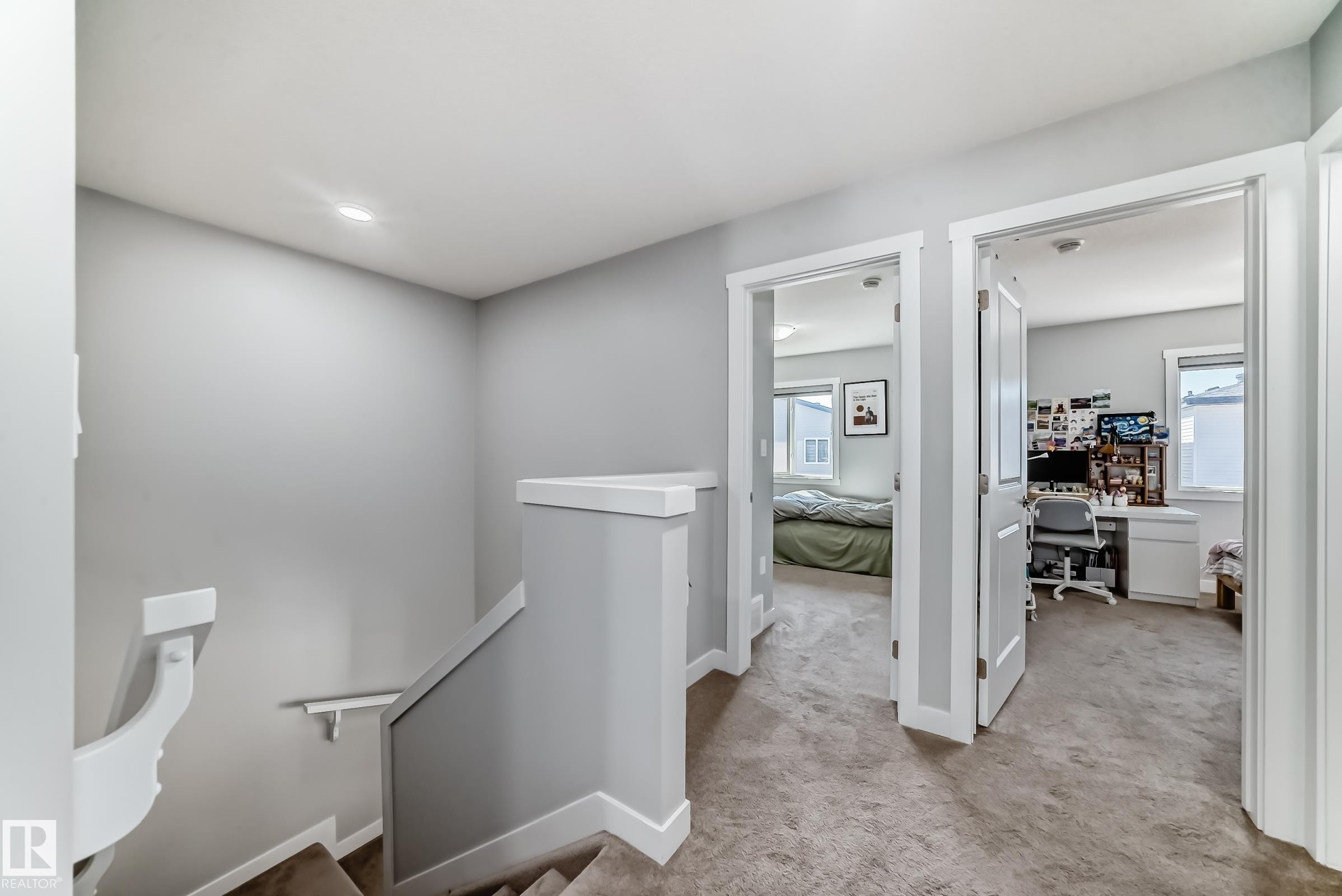 Second-story hallway featuring neutral gray walls and carpeting - 19635 29 Avenue, Edmonton, AB - Indoor Photo Showing Other Room