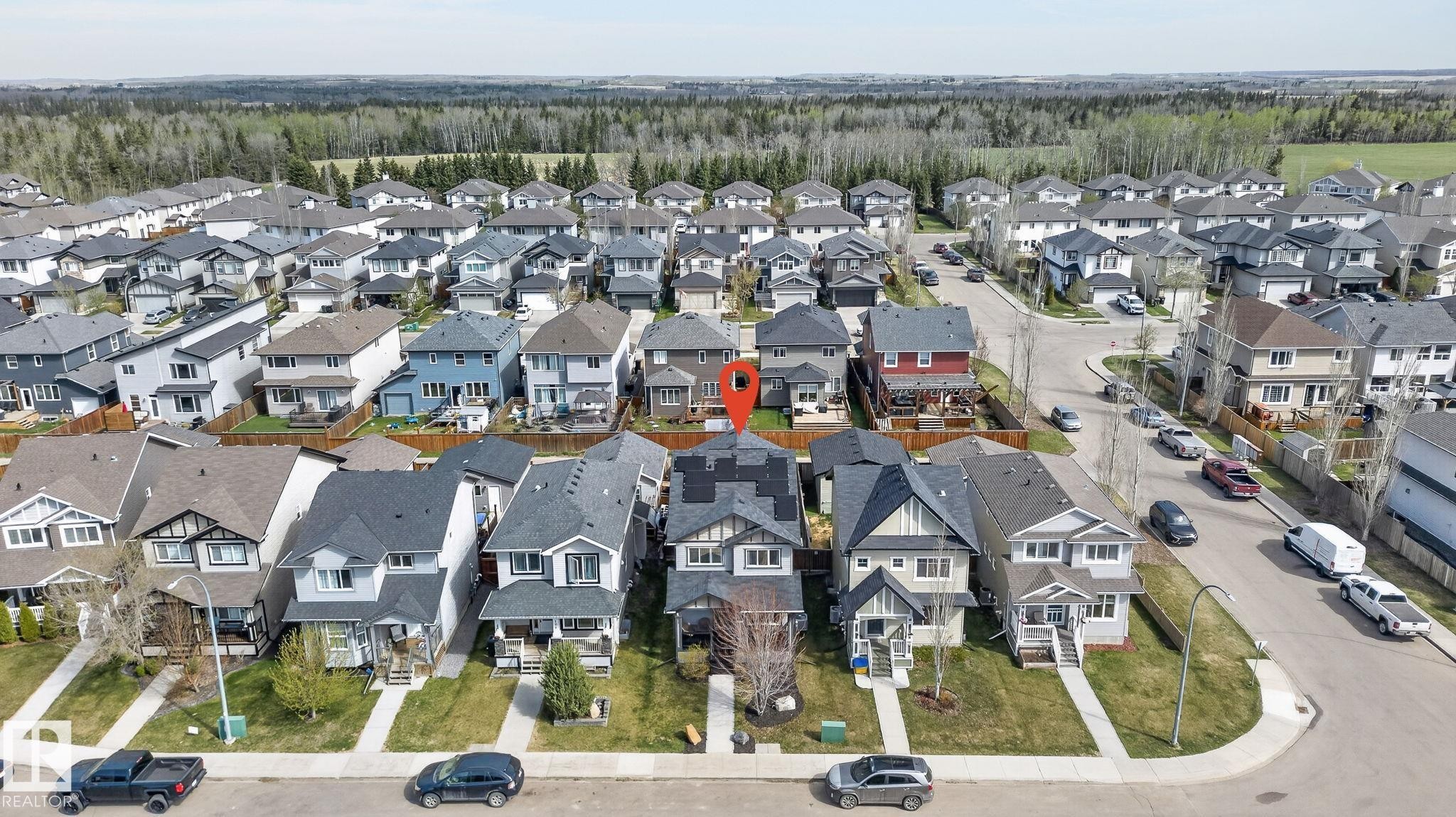 Residential neighborhood featuring a grid-pattern street layout and a variety of detached homes with distinct architectural styles - 108 Hewitt Circle, Spruce Grove, AB - Outdoor With View