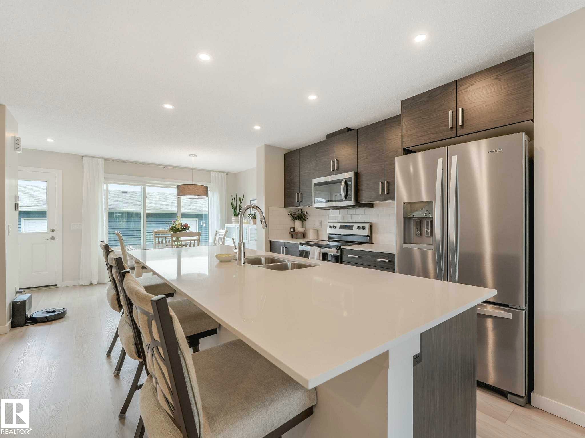 2426 Trumpeter Way, Edmonton, AB - Indoor Photo Showing Kitchen With Stainless Steel Kitchen With Double Sink With Upgraded Kitchen