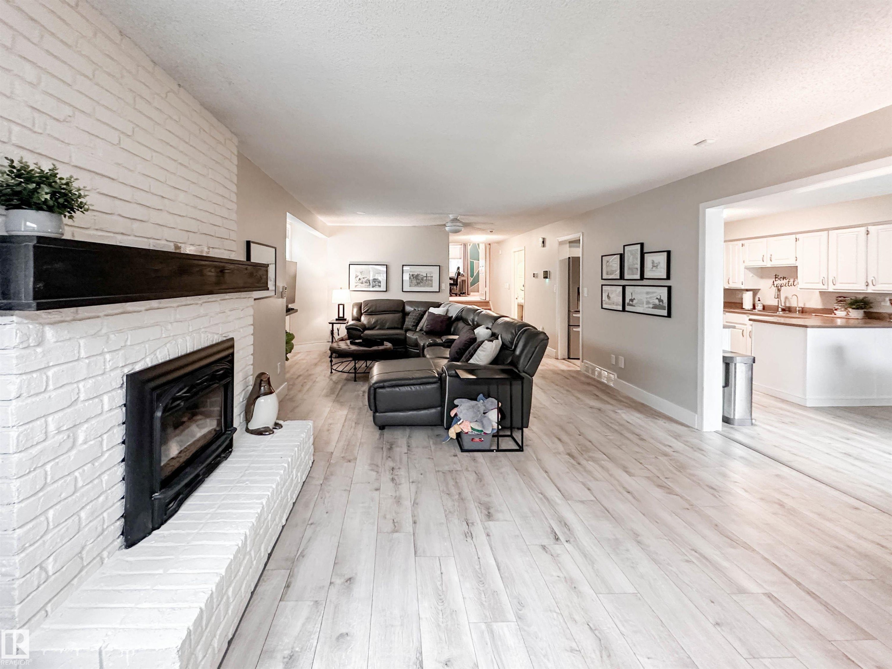 8 Whiteoaks Estates, St. Albert, AB - Indoor Photo Showing Living Room With Fireplace