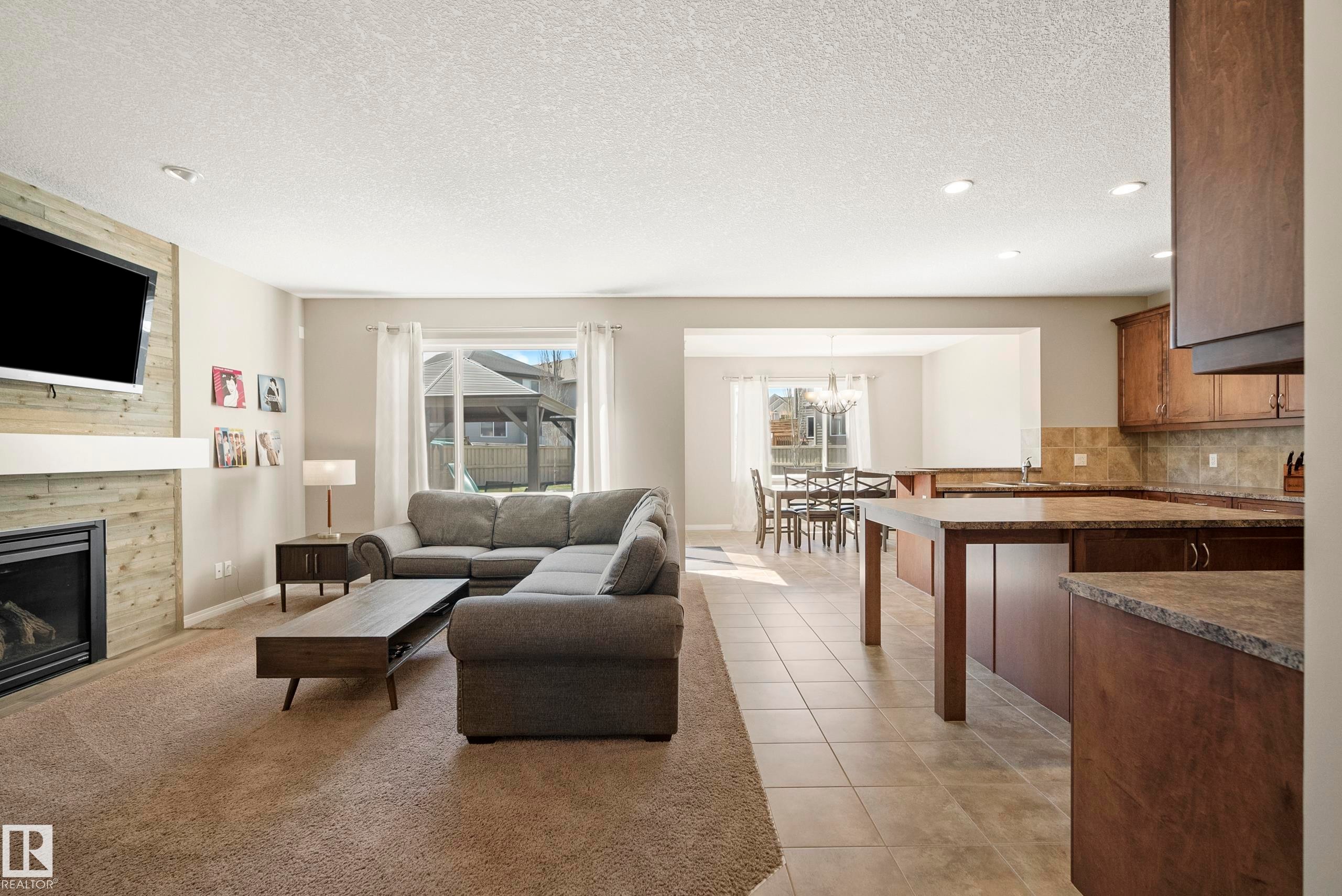3510 Abbott Close, Edmonton, AB - Indoor Photo Showing Living Room With Fireplace