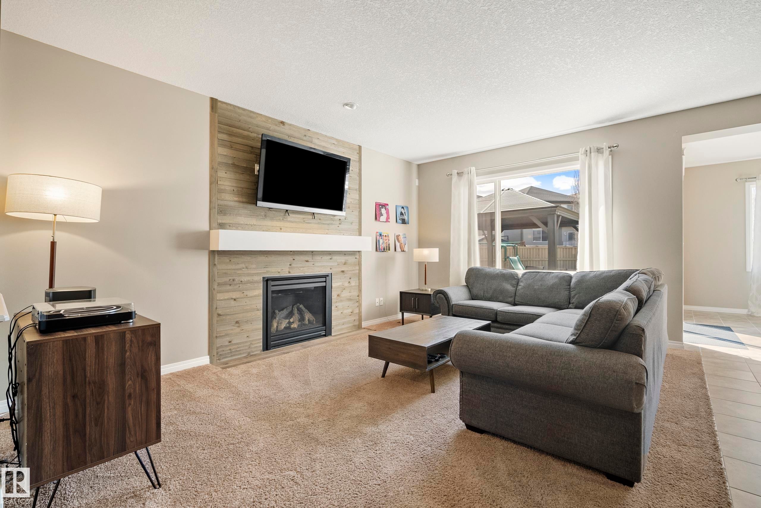 3510 Abbott Close, Edmonton, AB - Indoor Photo Showing Living Room With Fireplace