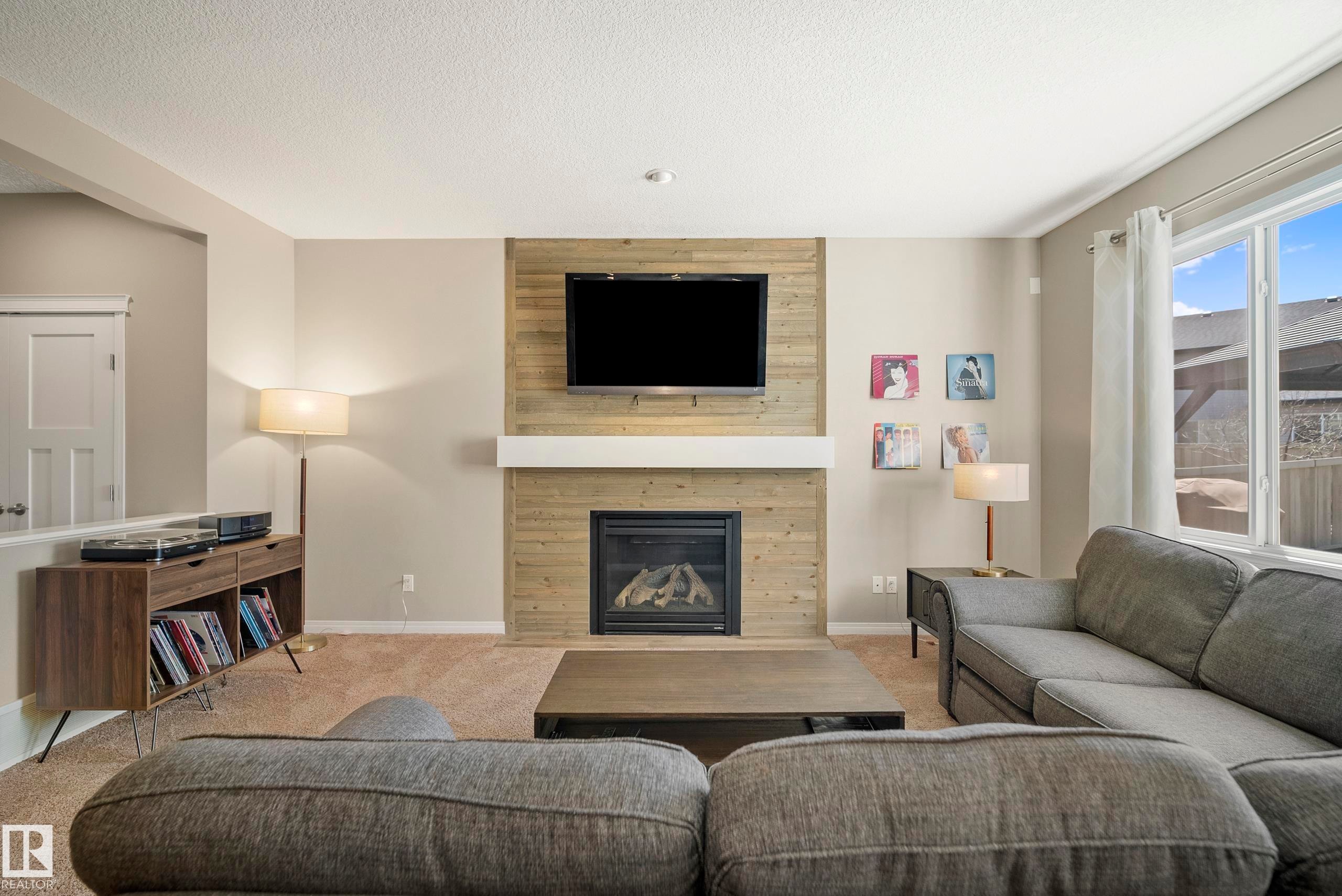 3510 Abbott Close, Edmonton, AB - Indoor Photo Showing Living Room With Fireplace