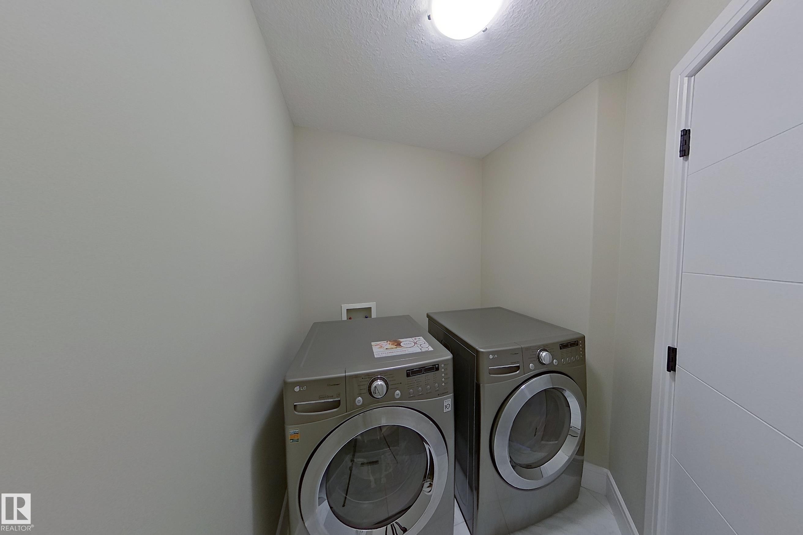 5512 64 Street, Beaumont, AB - Indoor Photo Showing Laundry Room