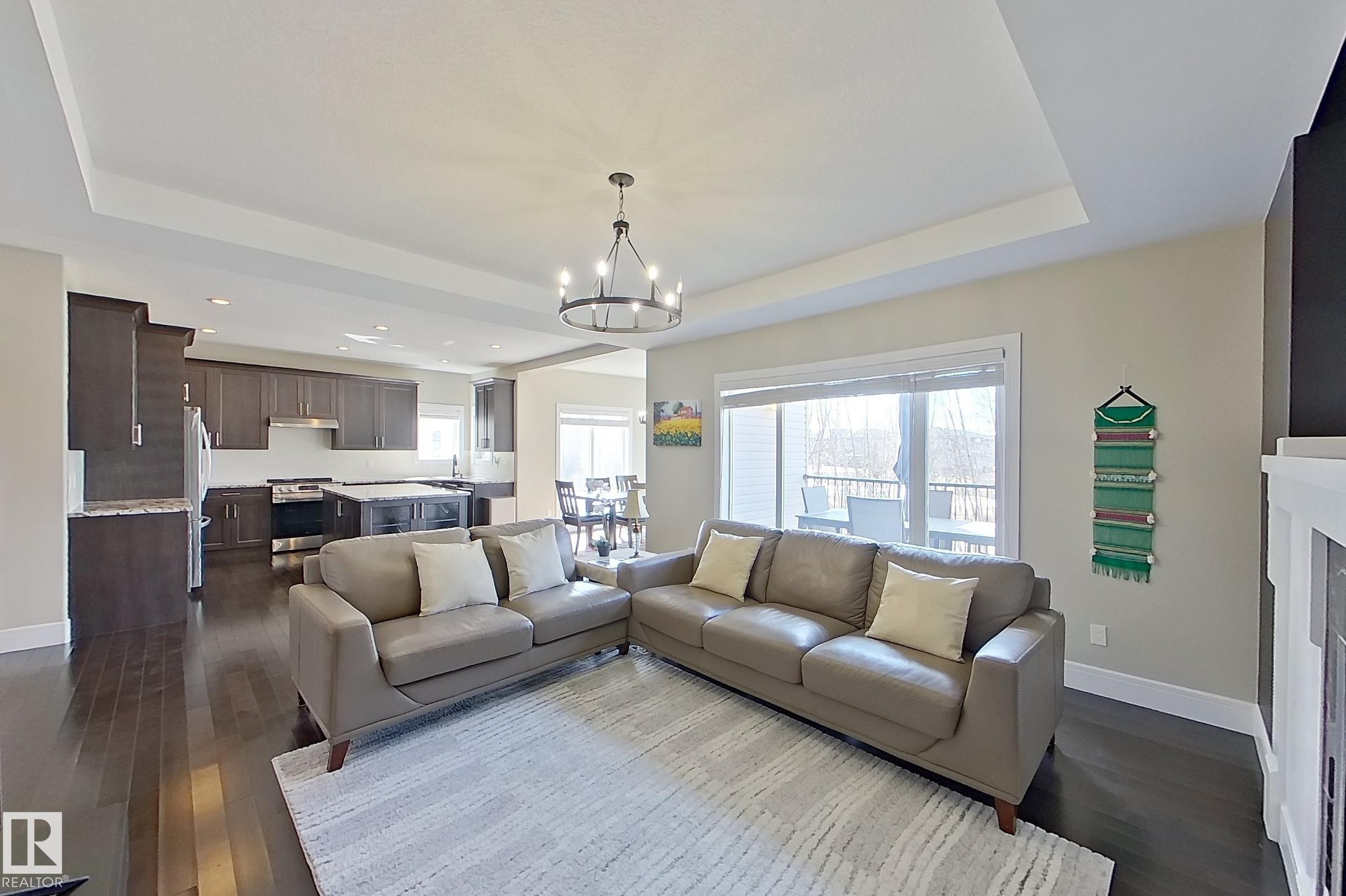 5512 64 Street, Beaumont, AB - Indoor Photo Showing Living Room With Fireplace