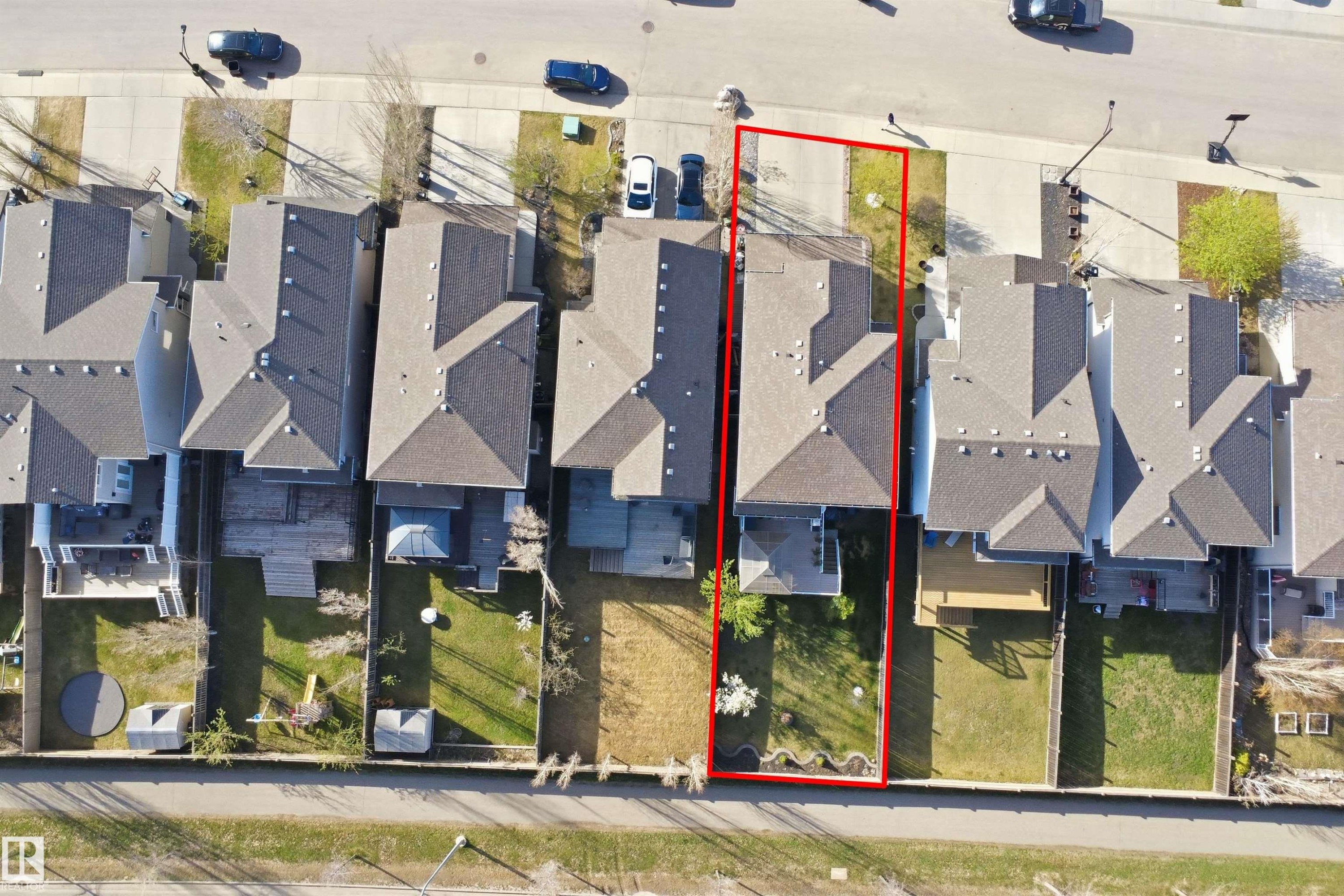 Aerial property overview featuring a shingle roof, paved driveway, and established landscaping - 1453 Hays Way Nw, Edmonton, AB - Other