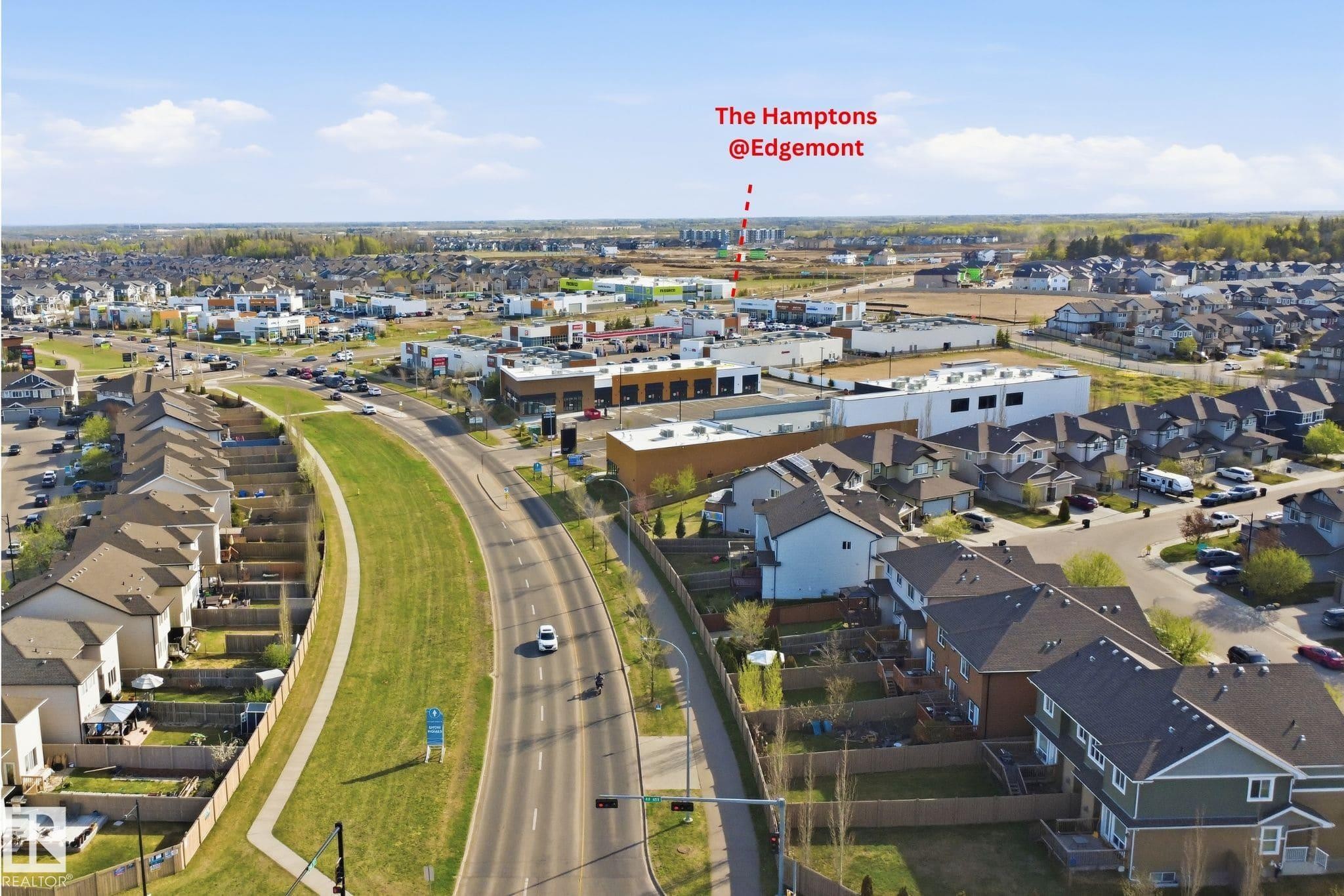 Aerial perspective showcasing a residential community with varied architectural styles - 1453 Hays Way Nw, Edmonton, AB - Outdoor With View