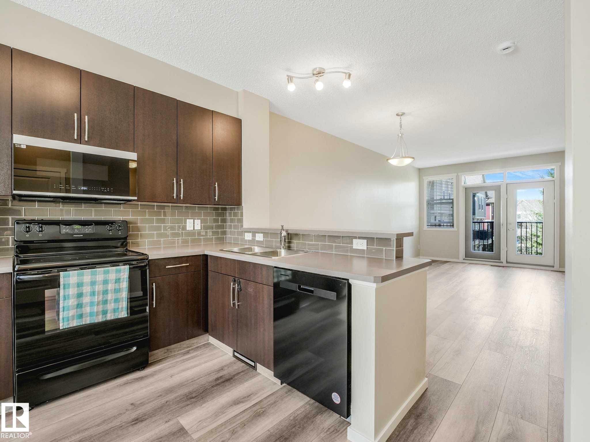 122 603 Watt Boulevard, Edmonton, AB - Indoor Photo Showing Kitchen With Double Sink