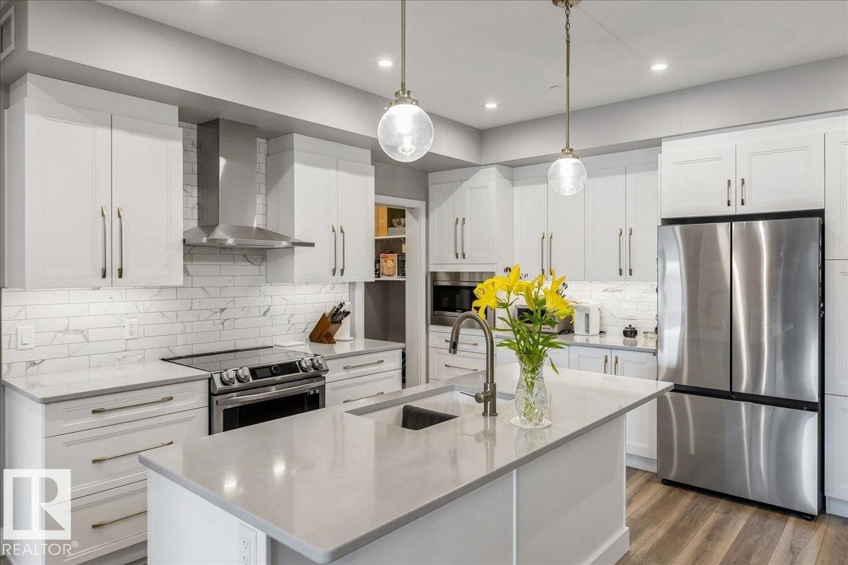 428 7463 May Common, Edmonton, AB - Indoor Photo Showing Kitchen With Stainless Steel Kitchen With Double Sink With Upgraded Kitchen