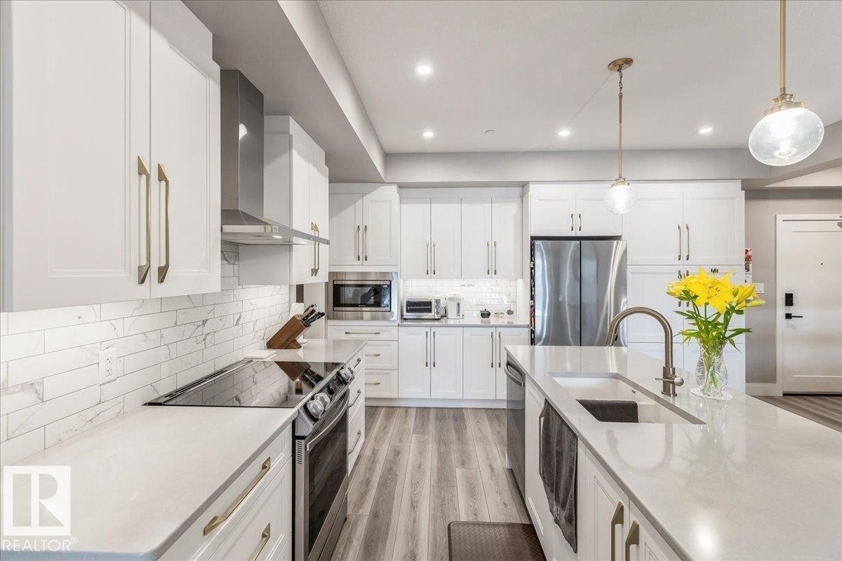 428 7463 May Common, Edmonton, AB - Indoor Photo Showing Kitchen With Stainless Steel Kitchen With Double Sink With Upgraded Kitchen