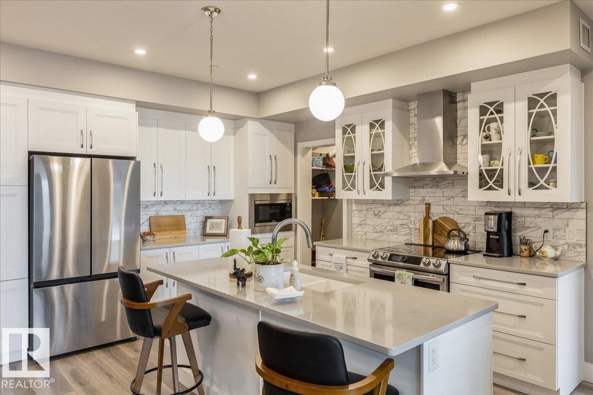 405 7463 May Common, Edmonton, AB - Indoor Photo Showing Kitchen With Stainless Steel Kitchen With Upgraded Kitchen