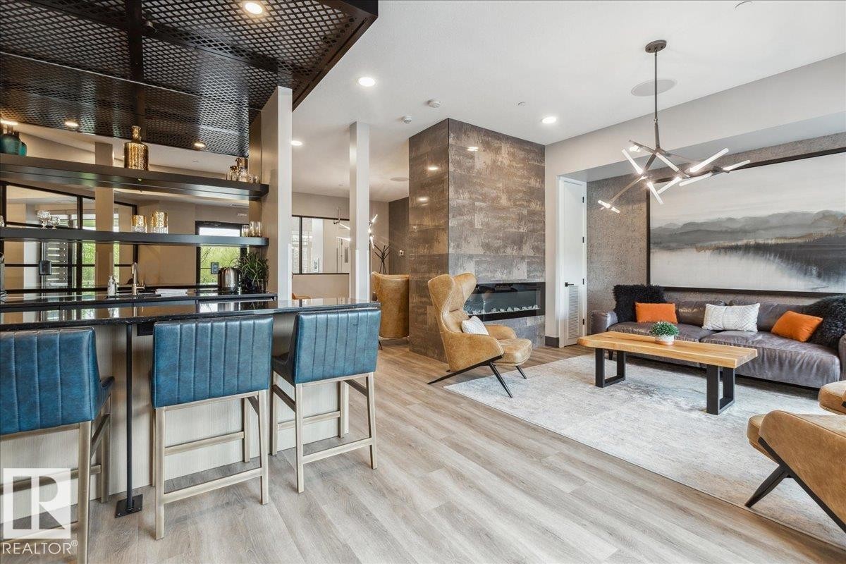 OWNER AMENITY - 405 7463 May Common, Edmonton, AB - Indoor With Fireplace