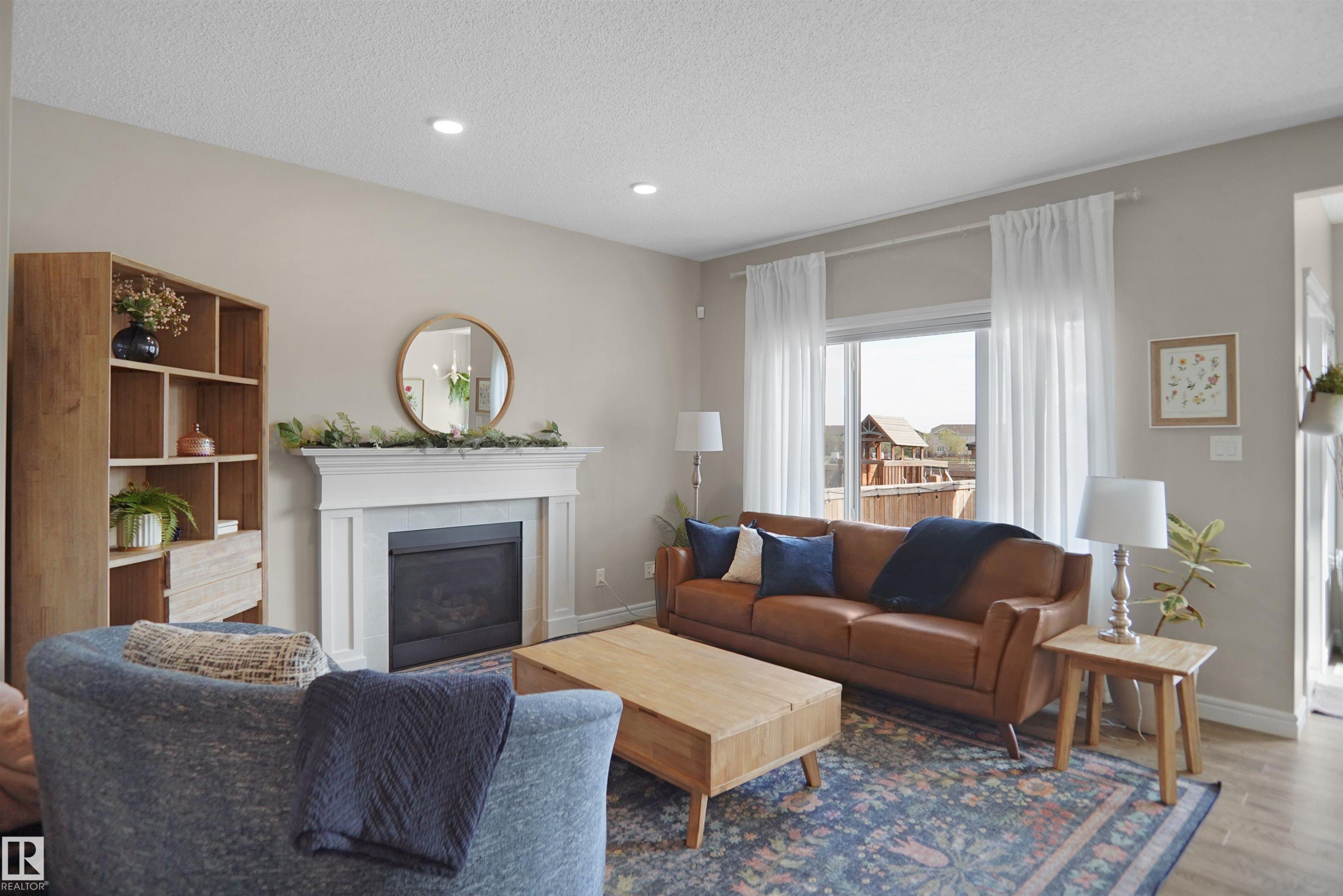 12351 176 Avenue, Edmonton, AB - Indoor Photo Showing Living Room With Fireplace