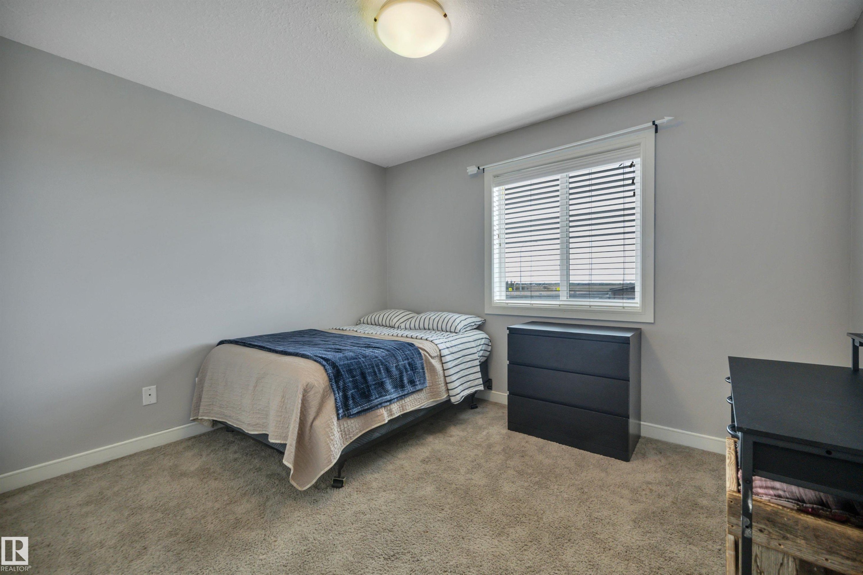 552 Reynalds Wynd, Leduc, AB - Indoor Photo Showing Bedroom