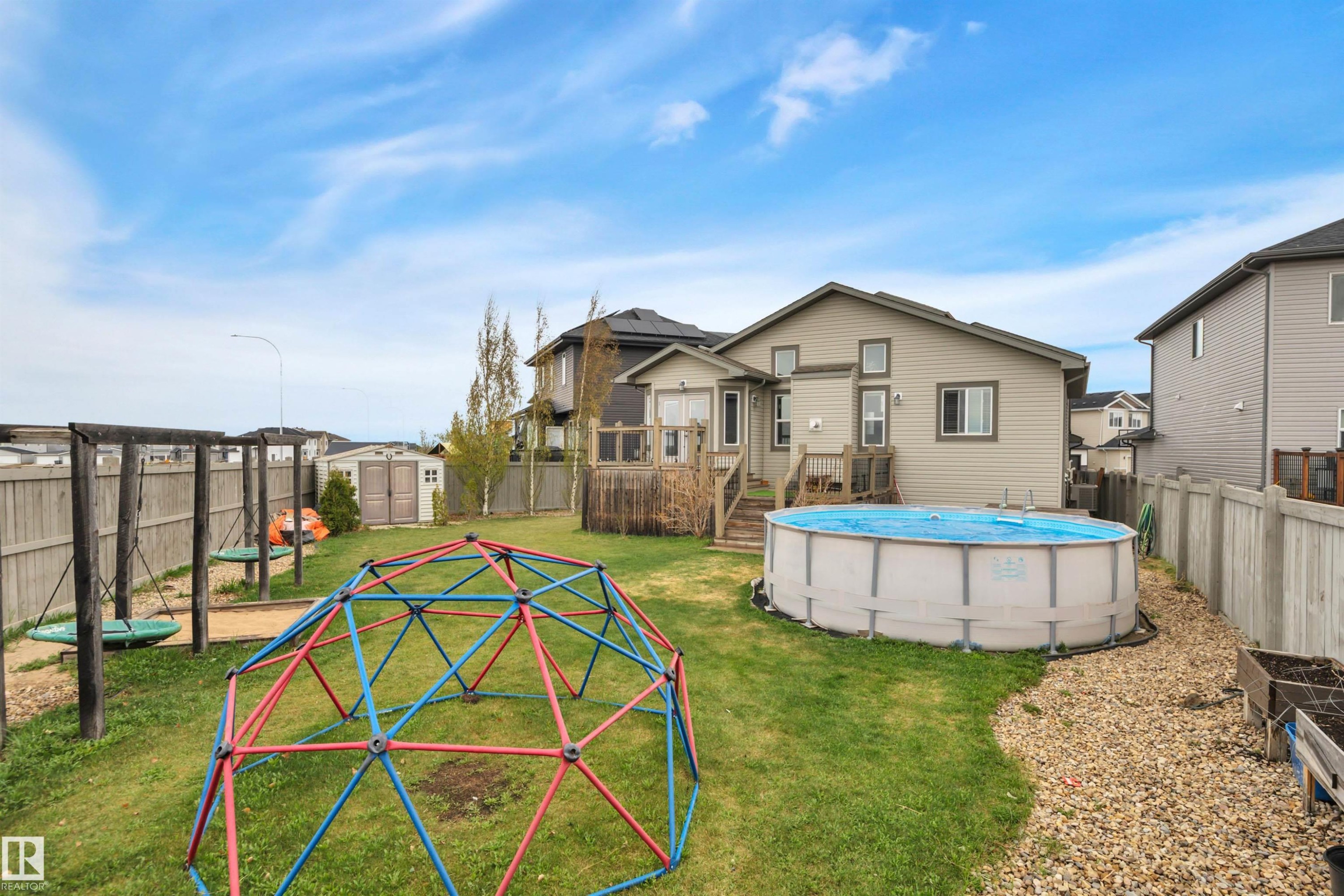 552 Reynalds Wynd, Leduc, AB - Outdoor With Above Ground Pool With Backyard