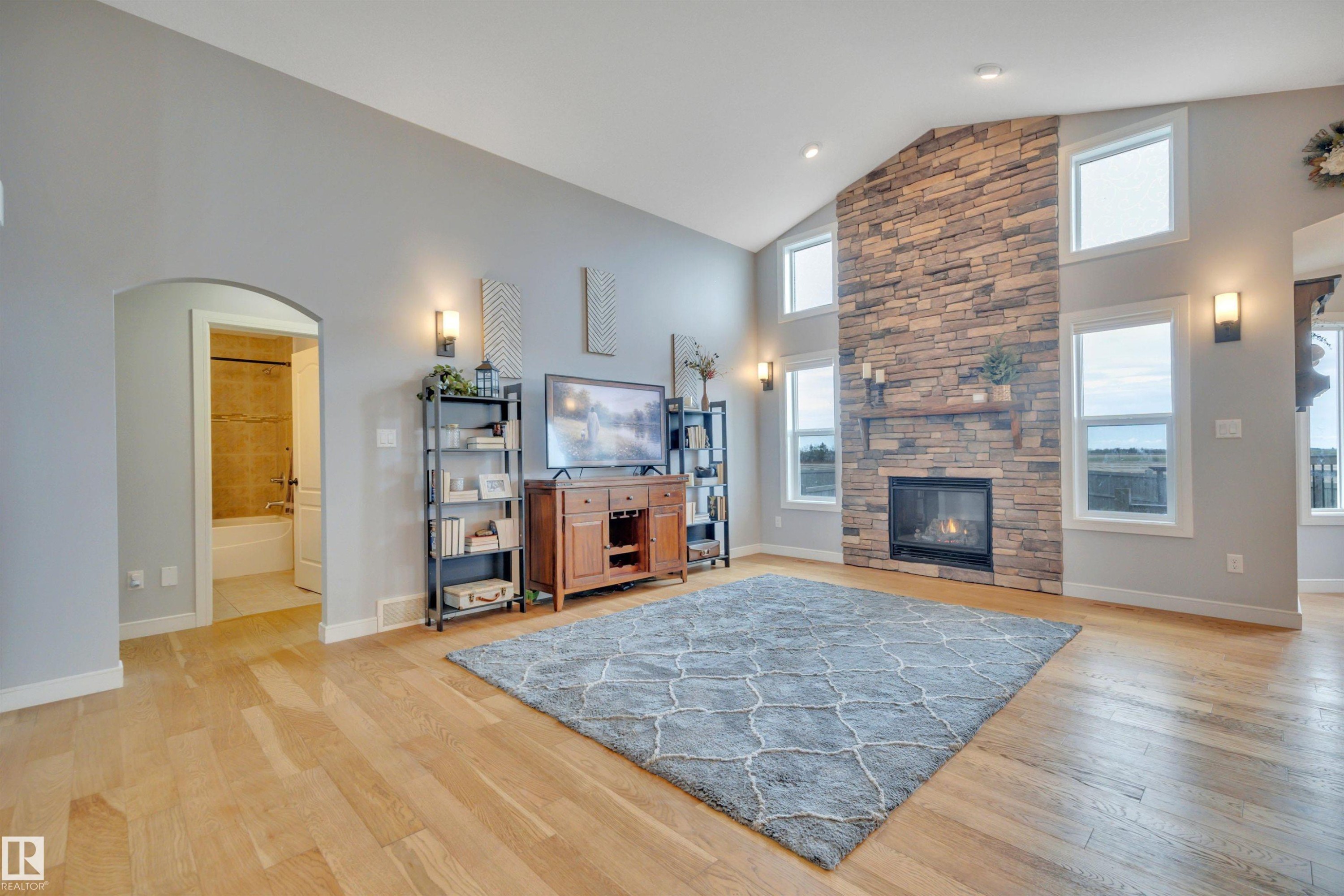 552 Reynalds Wynd, Leduc, AB - Indoor Photo Showing Living Room With Fireplace
