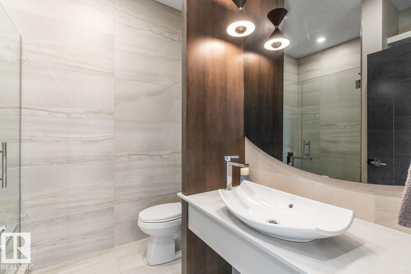 Main Floor 3 Piece Bathroom featuring Glass Shower and Vanity with Granite Countertops - 5536 Chegwin Point(E), Edmonton, AB - Indoor Photo Showing Bathroom