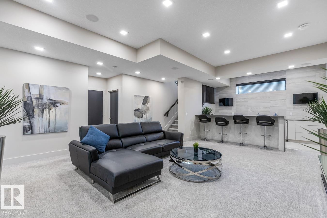 Perfect Space for Movie Nights! Unwind in your Basement Rec Room featuring a Full Wet Bar Space and Heated Floors - 5536 Chegwin Point(E), Edmonton, AB - Indoor