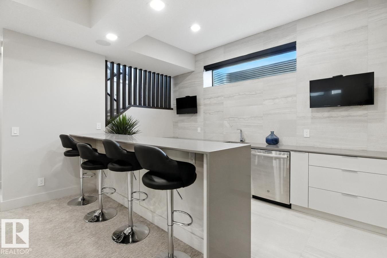 Basement Wet Bar featuring Additional Seating - 5536 Chegwin Point(E), Edmonton, AB - Indoor
