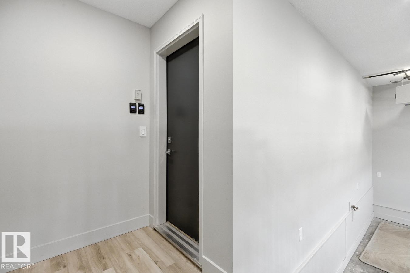 Entrance from the Garage to the Living Space - 5536 Chegwin Point(E), Edmonton, AB - Indoor Photo Showing Other Room