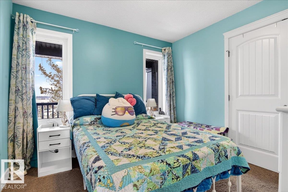 This room features light grey walls and a window providing natural light - 531064 Range Road 174, Rural Lamont County, AB - Indoor Photo Showing Bedroom