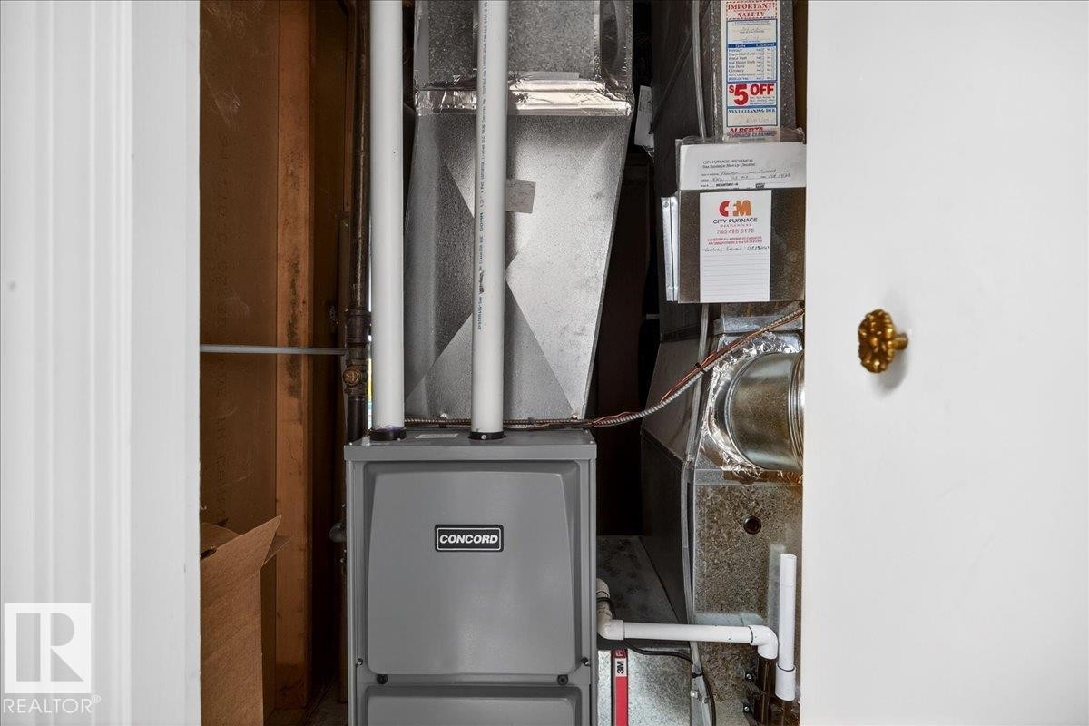 Concord furnace installation featuring white PVC piping and galvanized ductwork - 4212 105 Avenue, Edmonton, AB - Indoor Photo Showing Other Room