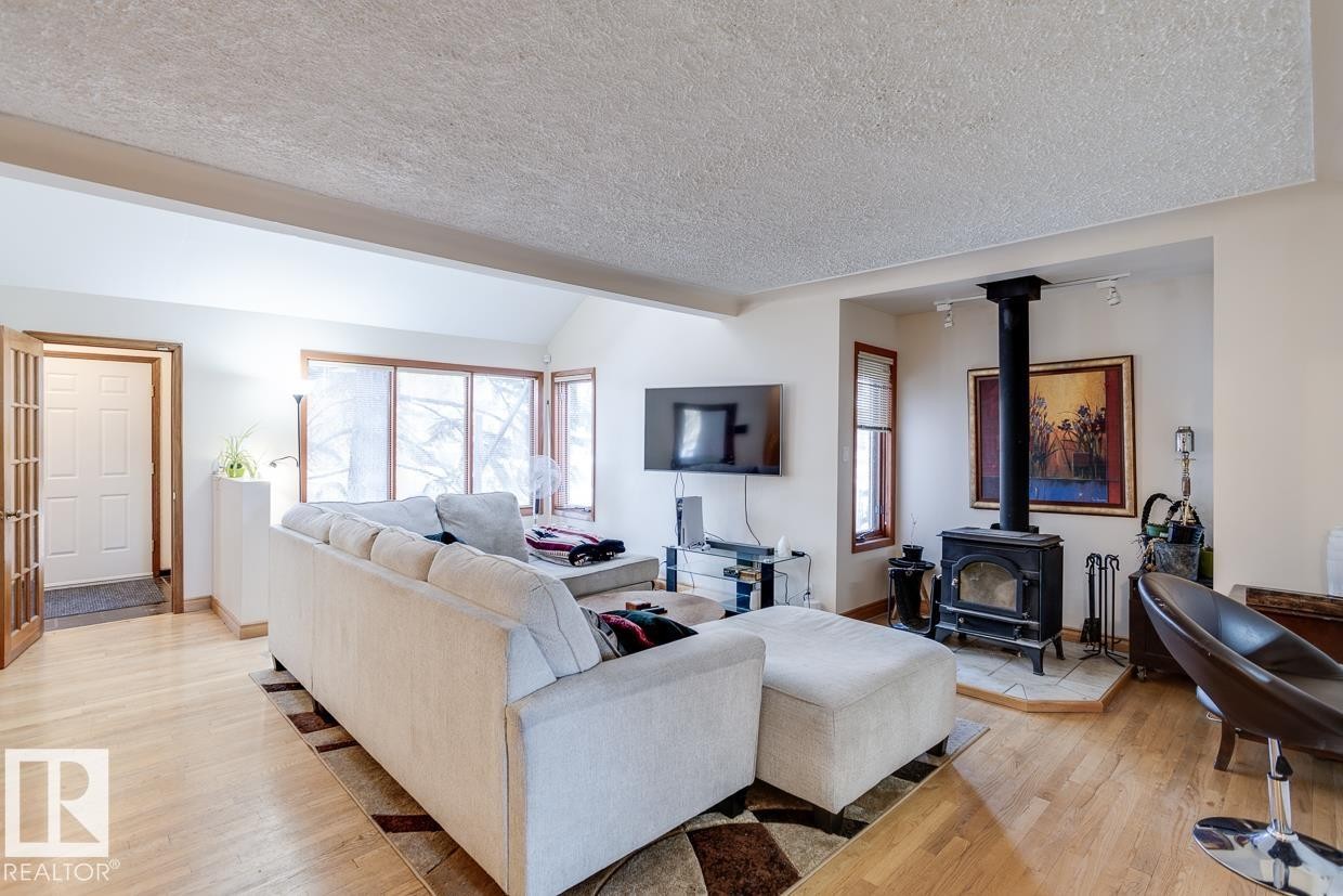 14002 106 Avenue, Edmonton, AB - Indoor Photo Showing Living Room With Fireplace