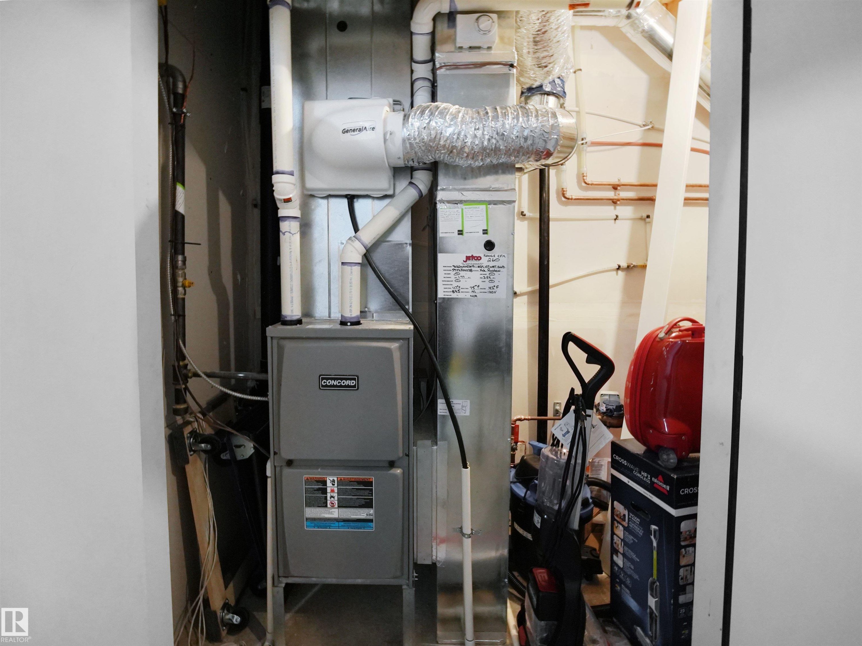 The property includes a Concord furnace system with associated ductwork and piping - 64 655 Watt Boulevard, Edmonton, AB - Indoor Photo Showing Basement