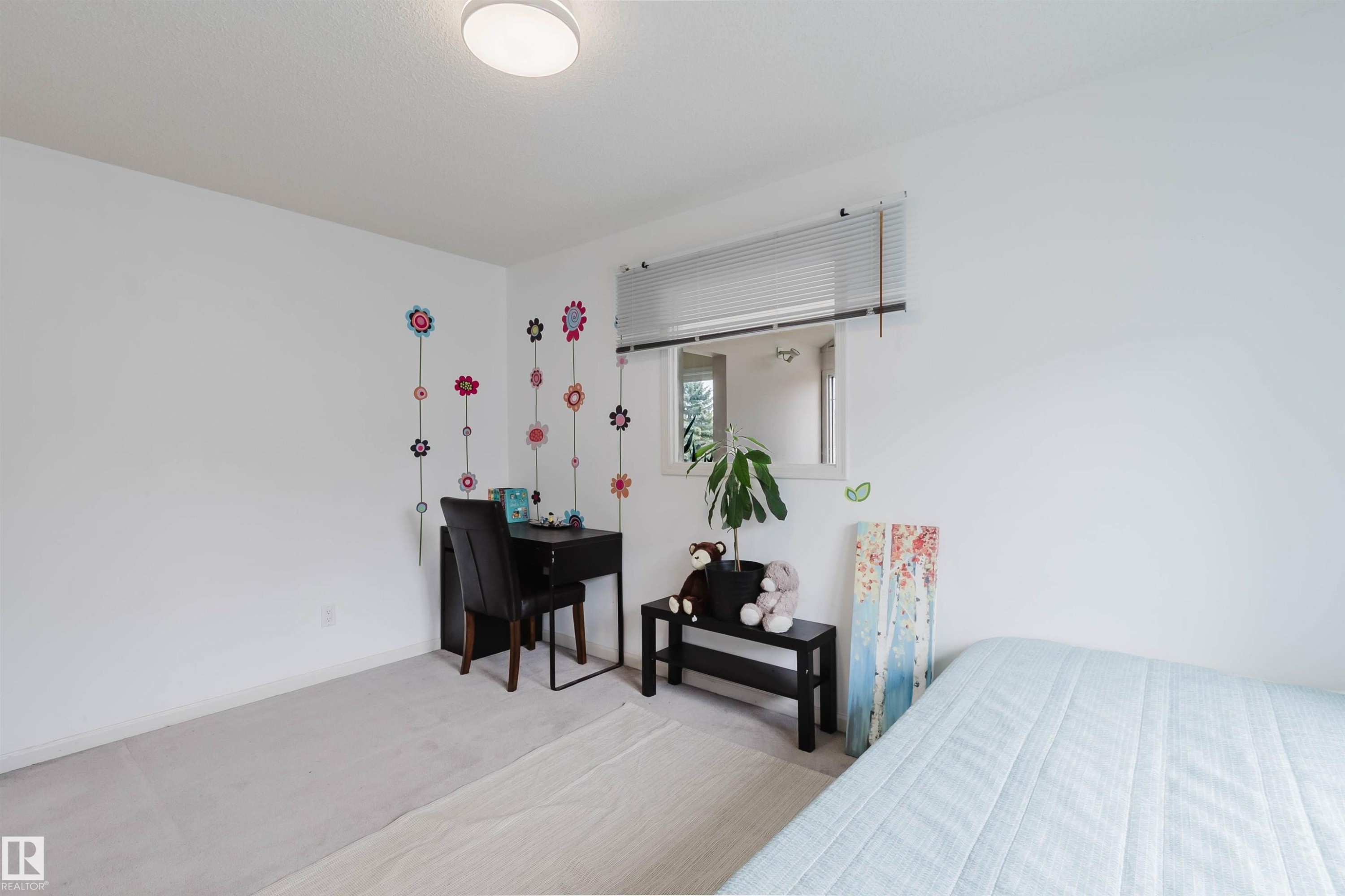 Room featuring light-toned carpet flooring, white walls, and a single window with horizontal blinds - 342 O'Connor Close, Edmonton, AB - Indoor Photo Showing Bedroom