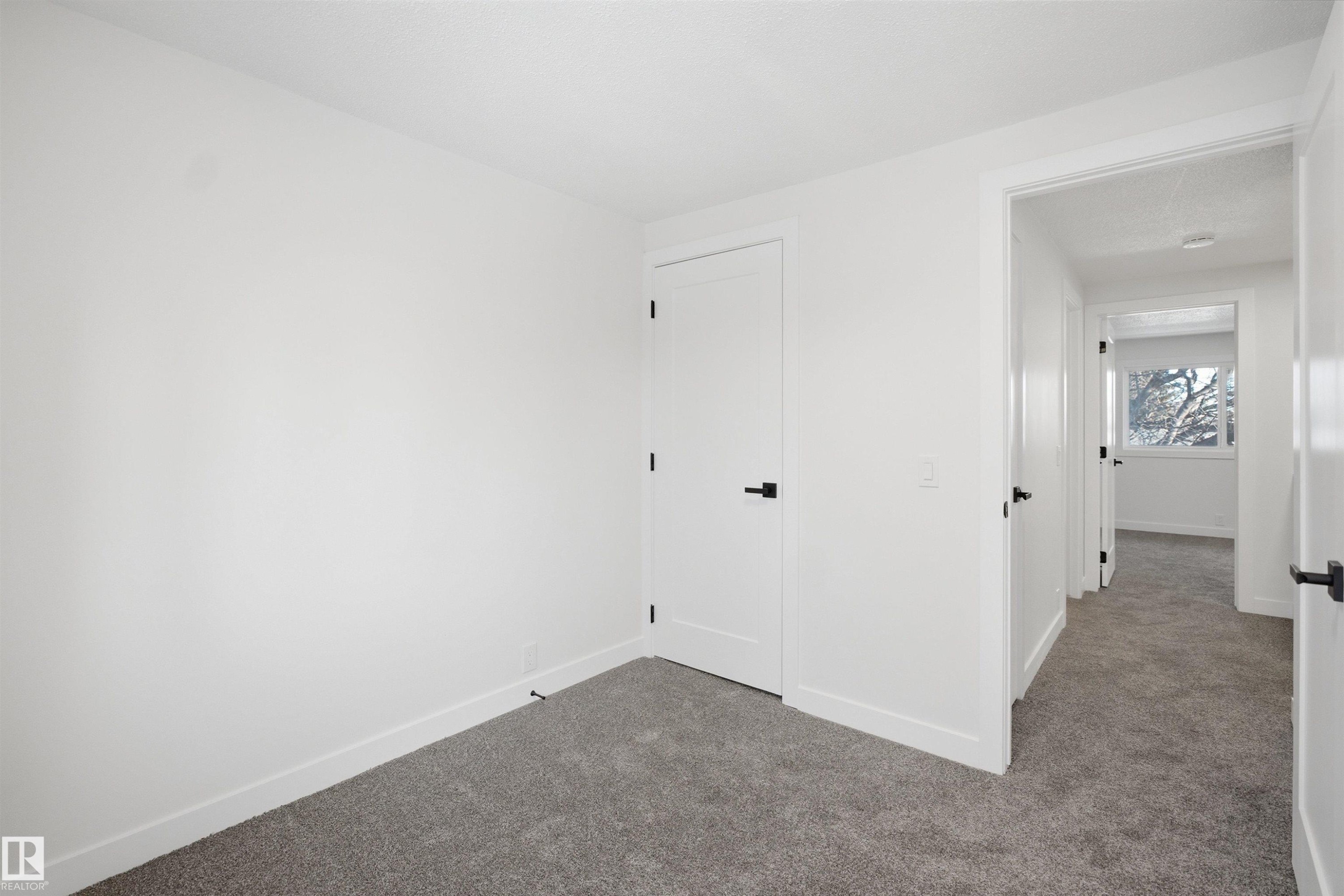 Room featuring gray carpet, white walls, and white trim - 1706 37 Street, Edmonton, AB - Indoor Photo Showing Other Room