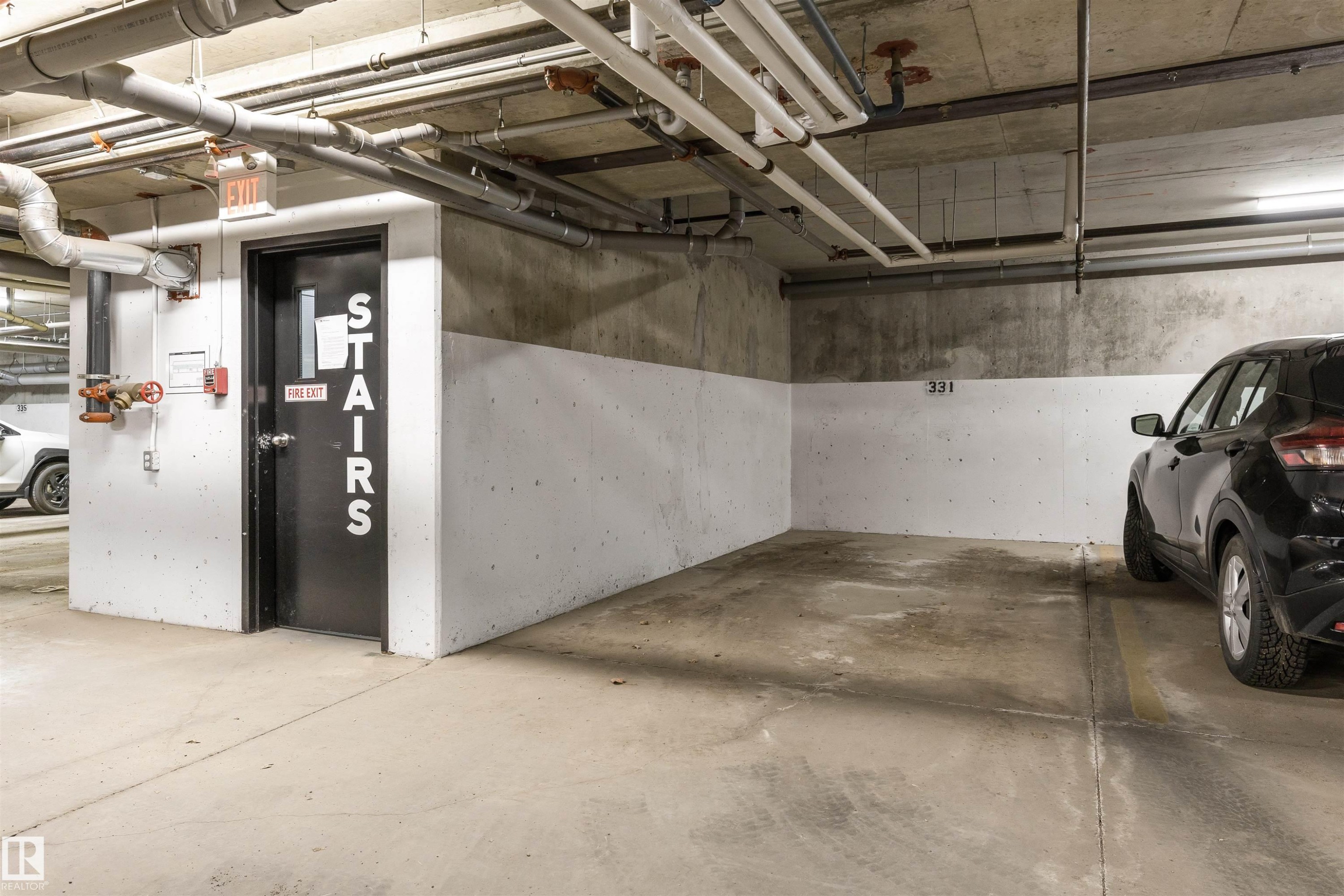 110 9517 160 Avenue, Edmonton, AB - Indoor Photo Showing Garage