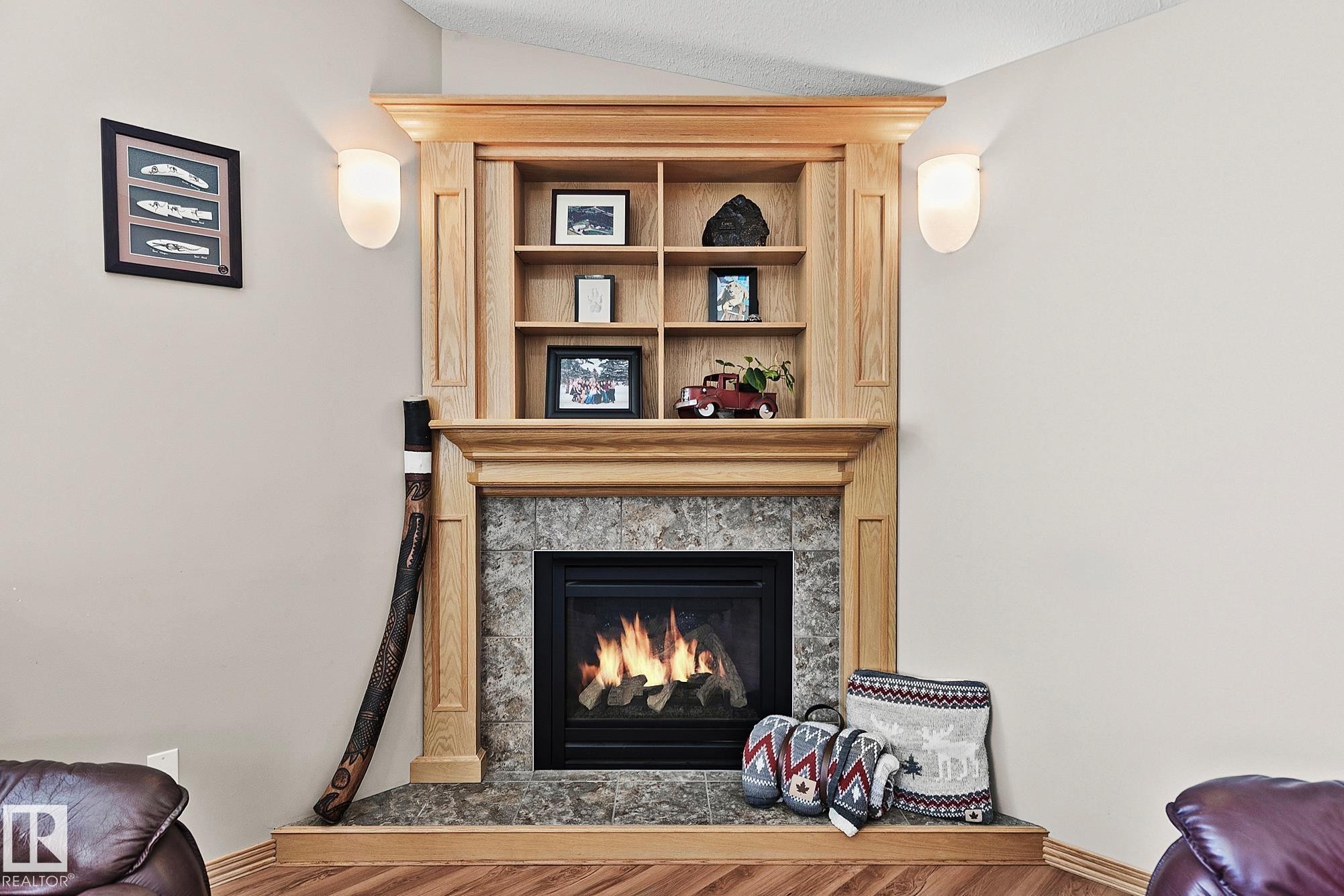 98 Hewitt Circle, Spruce Grove, AB - Indoor Photo Showing Living Room With Fireplace