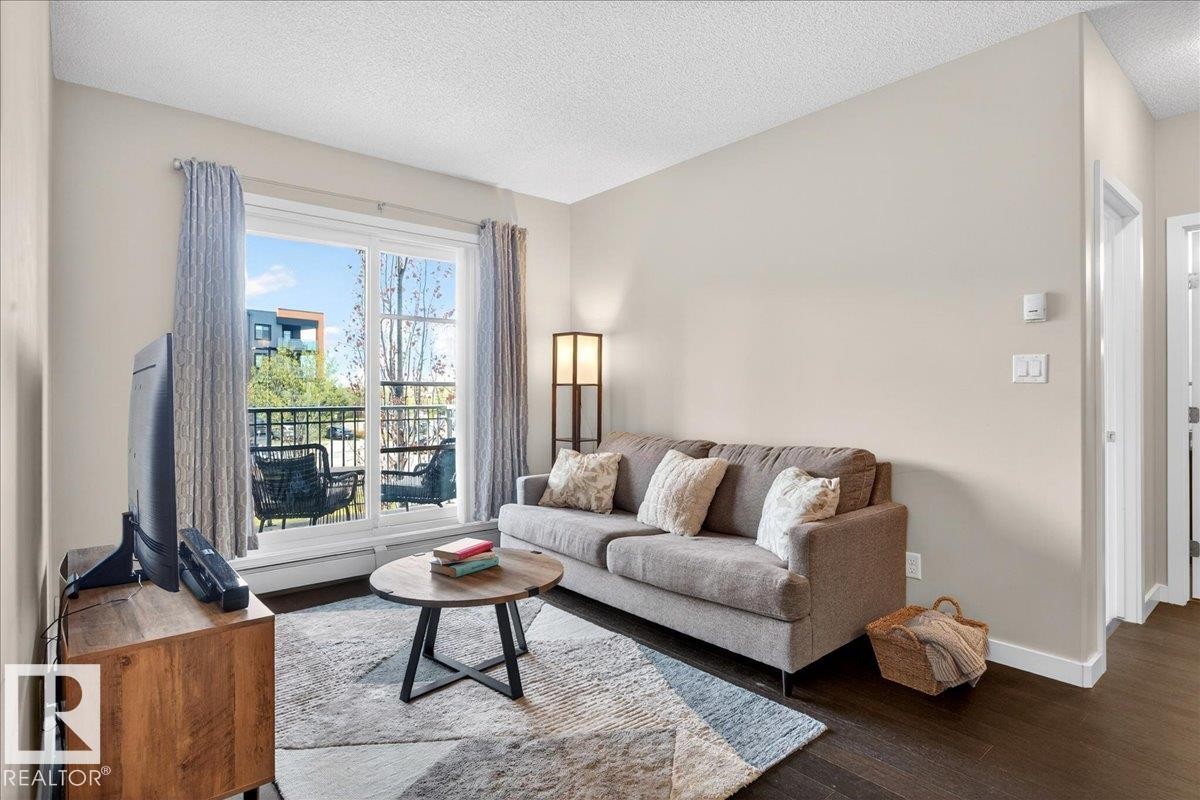 205 507 Albany Way, Edmonton, AB - Indoor Photo Showing Living Room