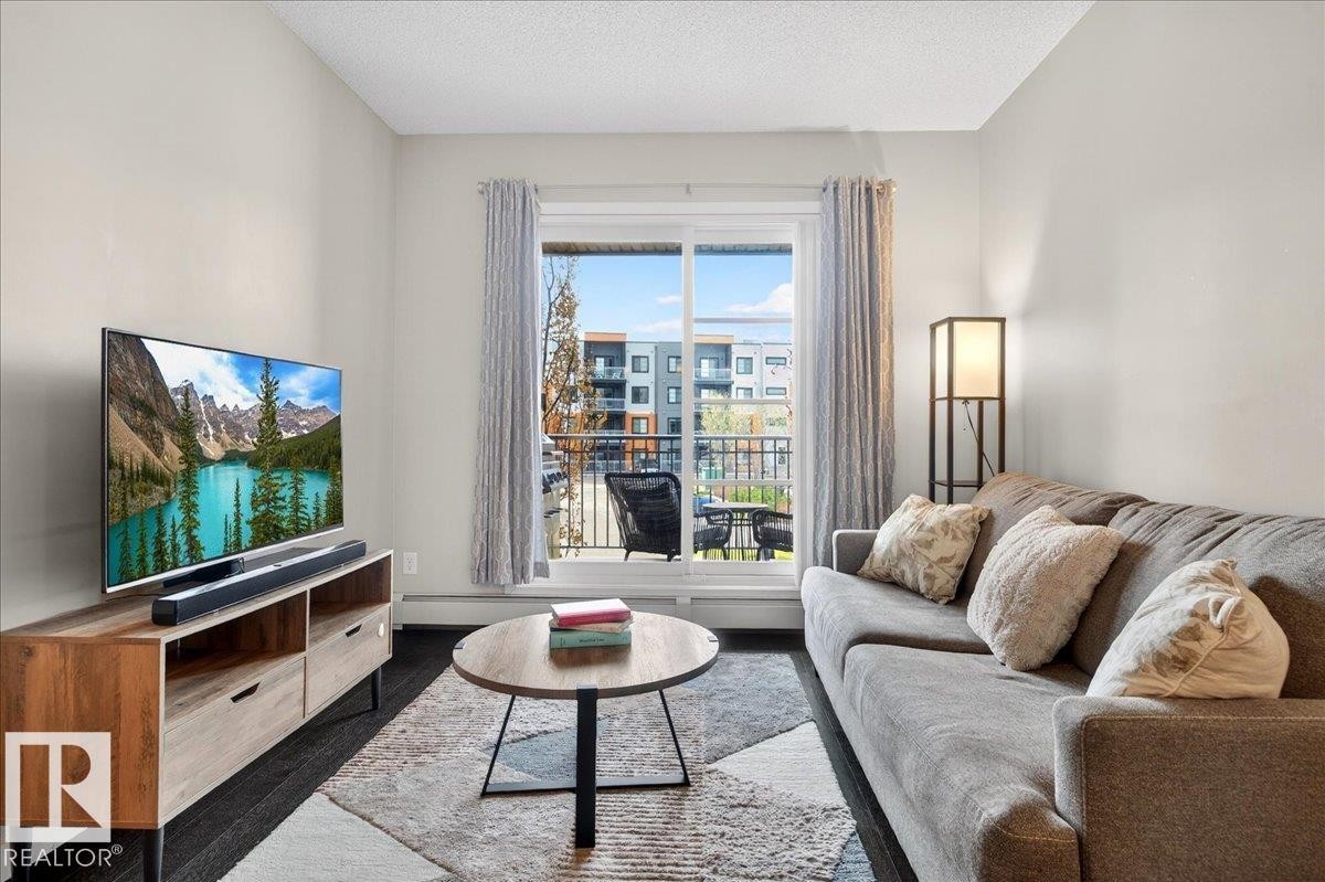 205 507 Albany Way, Edmonton, AB - Indoor Photo Showing Living Room