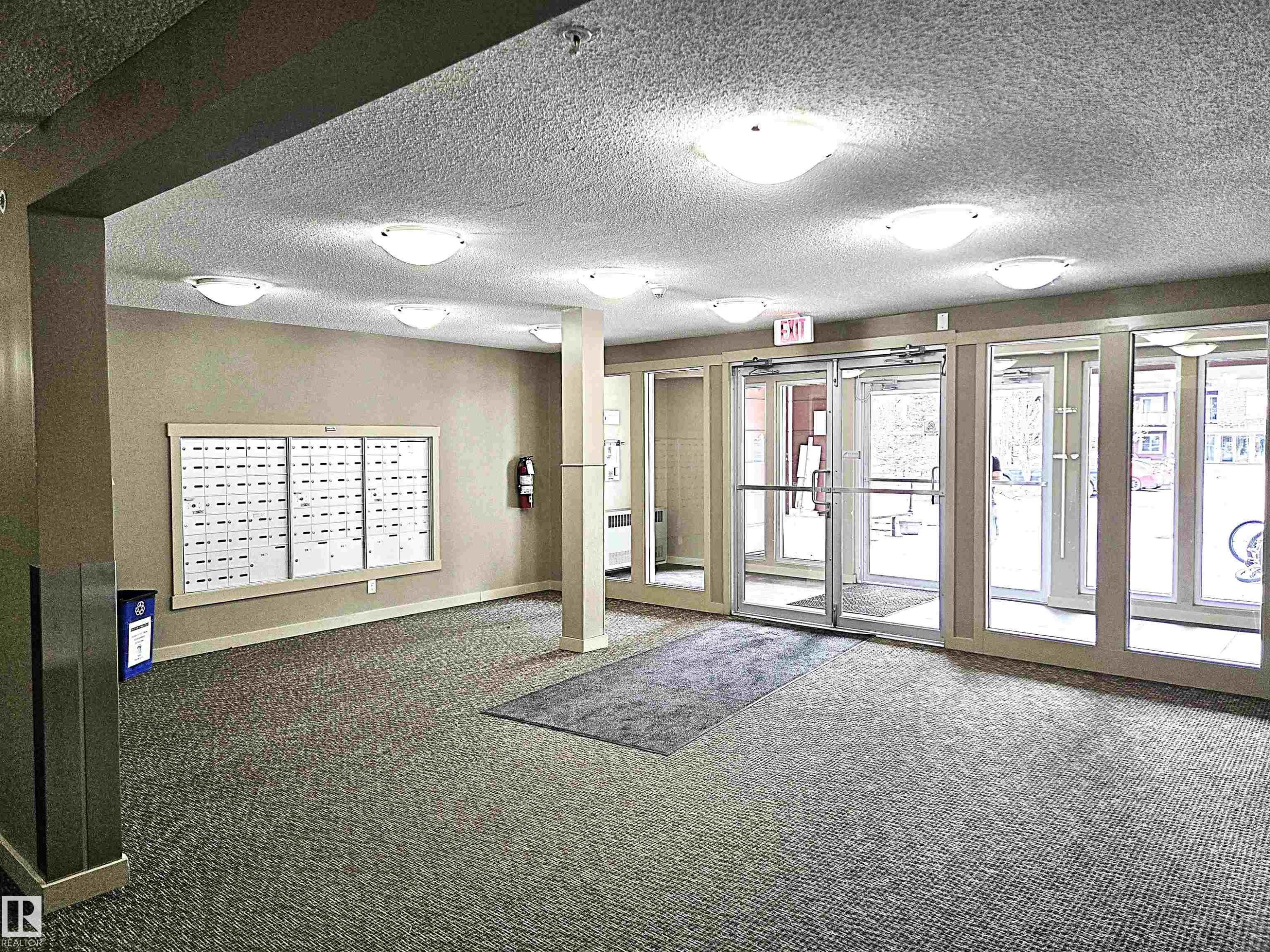 210 3207 James Mowatt Trail, Edmonton, AB - Outdoor With Balcony With Facade
